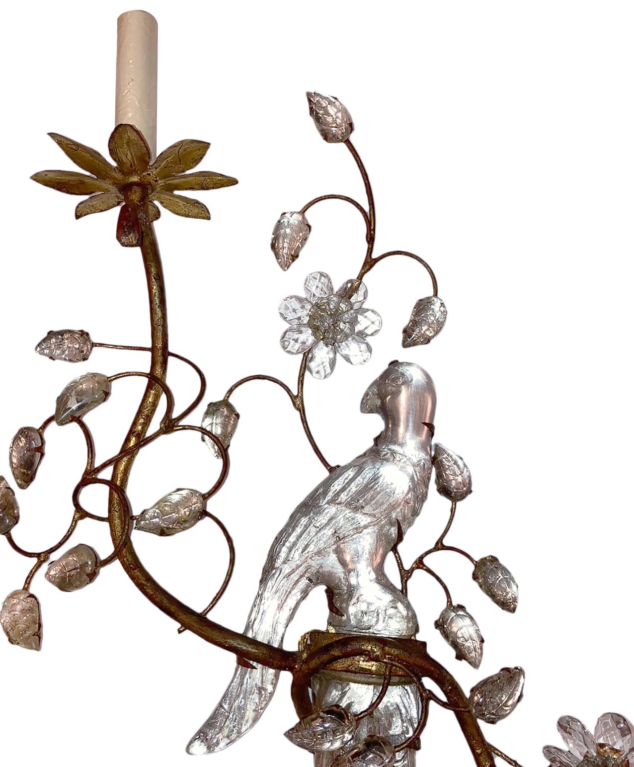 Set of four French circa 1950s gilt metal double light sconces with molded glass birds. Sold in pairs.

Measurements:
Height 23