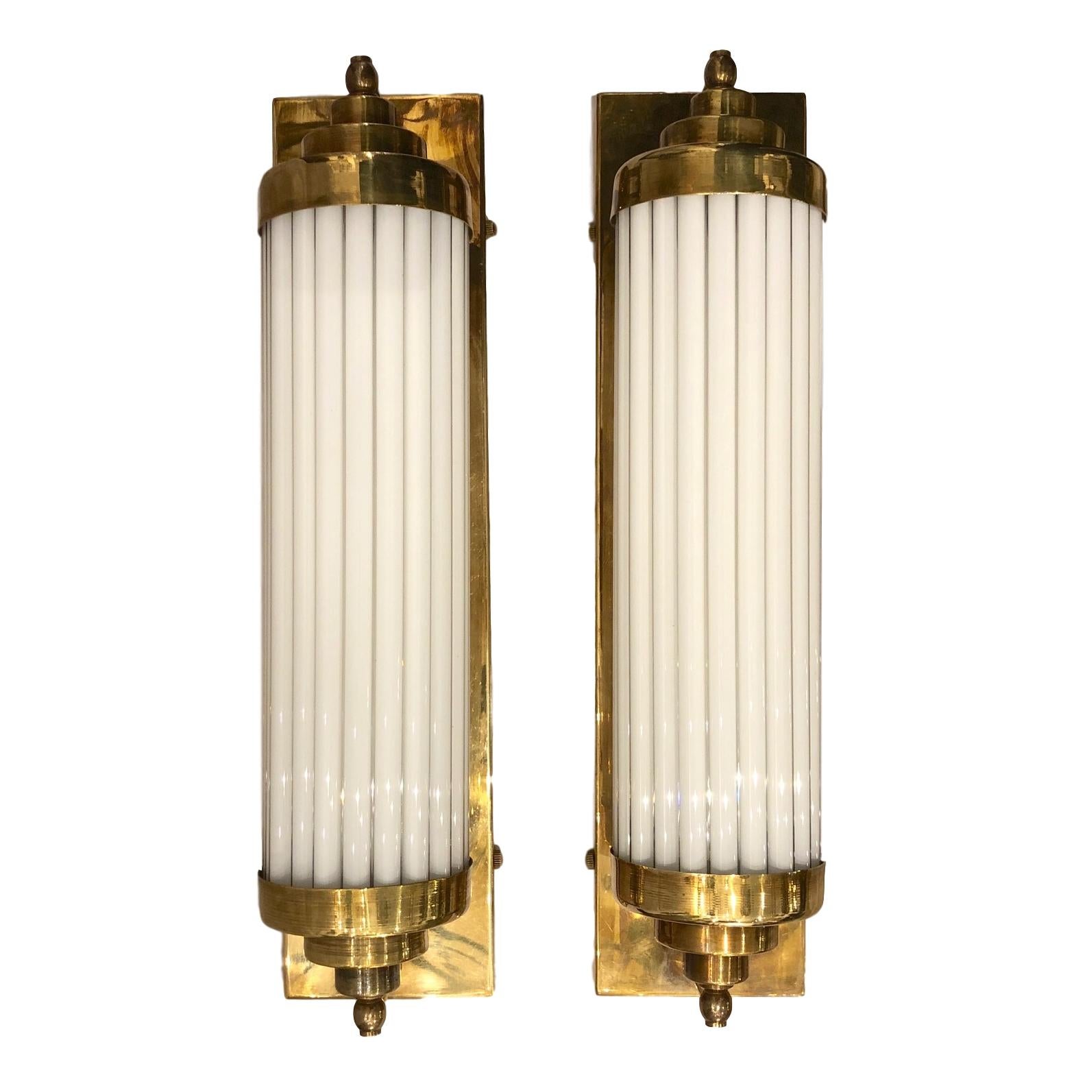 Set of 4 French circa 1950s French opaline glass rods sconces. Sold per pair.

Measurements:
Height: 17