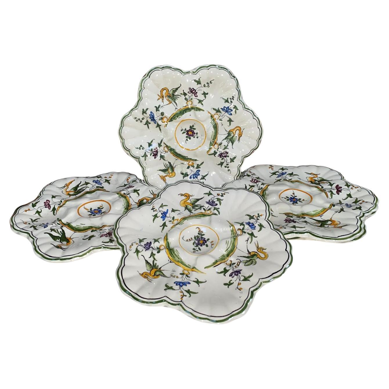 Set of 12 French Faience oysters plates & 1 platter signed Cabare circa 1950.
Decor of birds and flowers
platter 15.5 inches , 12 plates 9.5 inches diameter.