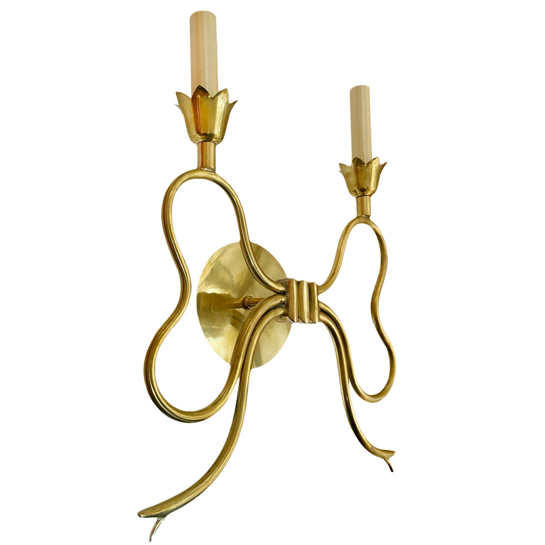A set of four mid-century French Moderne sconces. Sold in pairs.

Measurements:
Height: 12