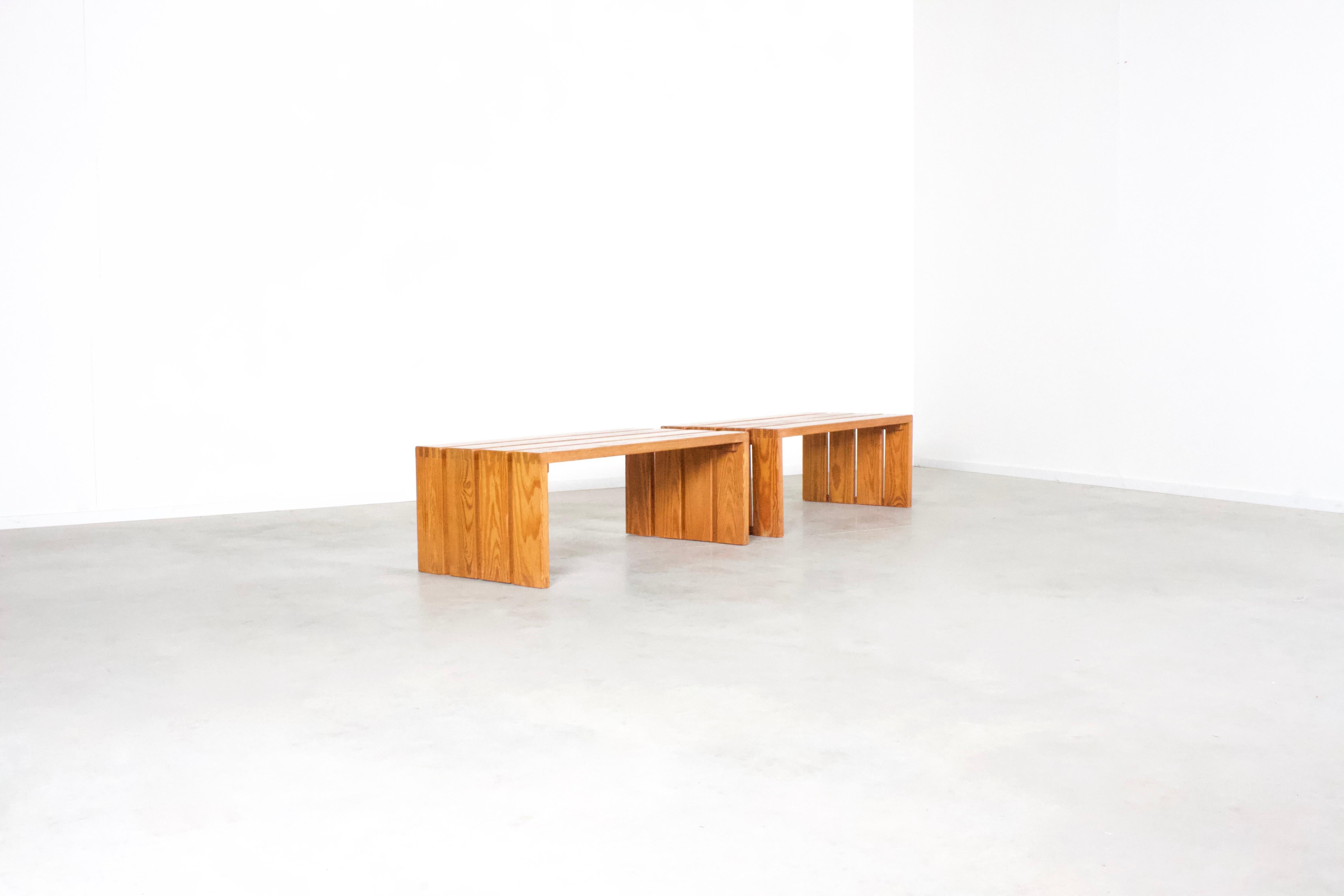 Set of French pine wood benches in very good condition.

Made of solid pine wood slats which are connected with typical joints.

The style reminds of Scandinavian modernism, like Swedish designer Sven Larsson or French designer Charlotte