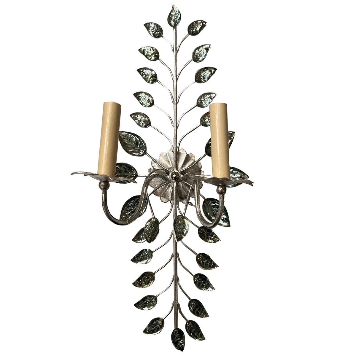 Set of four French circa 1940’s silver-leaf two-arm sconces with molded glass leaves. Sold per pair.

Measurements:
Height 22.5?
Width: 9.5?
Depth: 6.25?