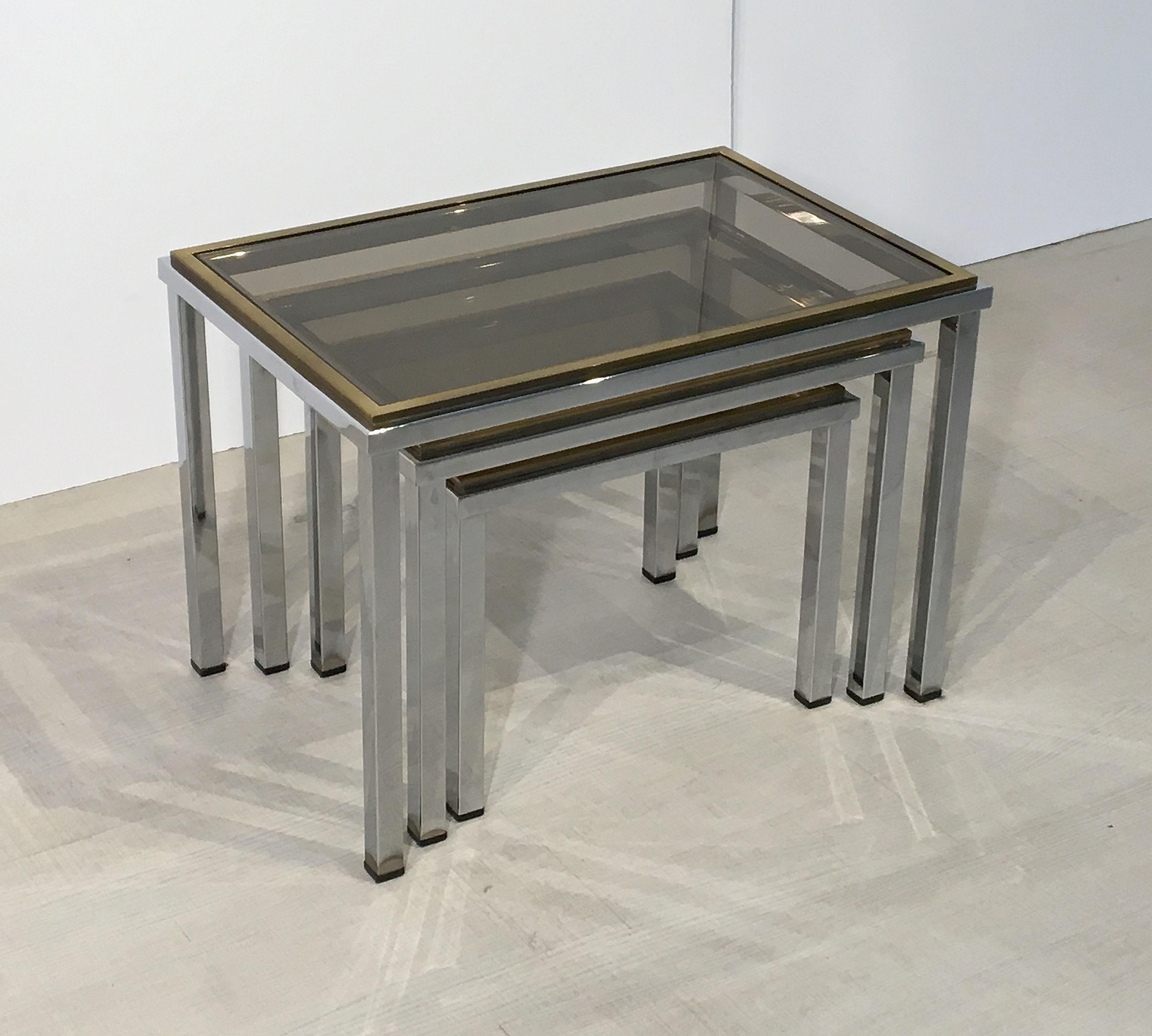 20th Century Set of French Stacking or Nesting Tables of Chrome and Brass
