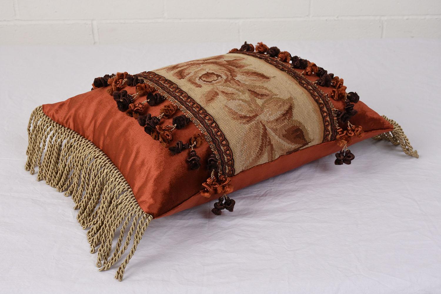 This Beautiful Pair of French Accent Pillows are made out of antique tapestry and combination with velvet fabric and decorative multicolored tassels the tapestries depicting floral decorative details and are finished with red velvet on the sides