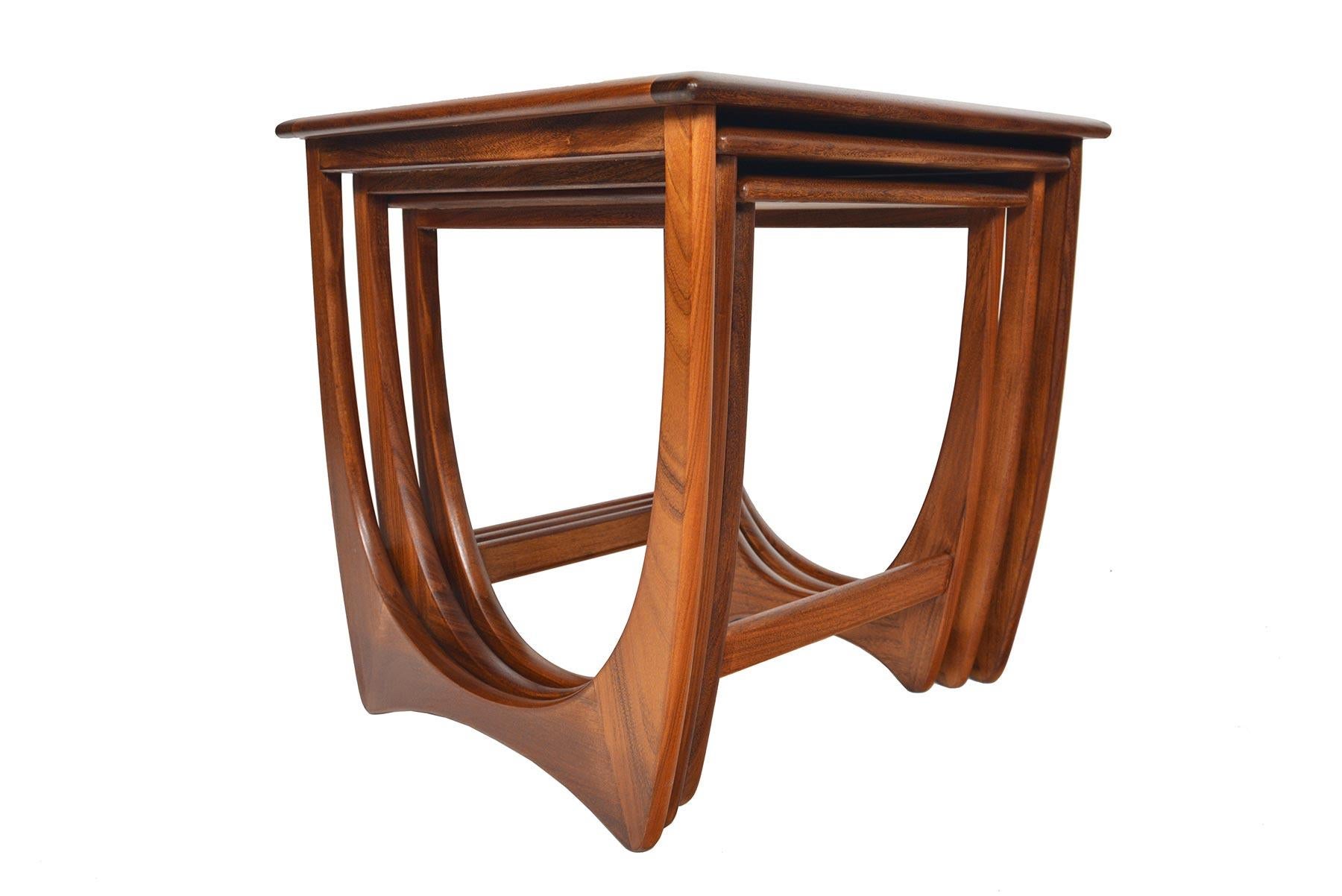 This timeless set of mid century modern G Plan Astro teak nesting tables was designed by Victor Wilkins in the 1960s. Gorgeous design and exceptional construction throughout. Recently refinished and in excellent condition.

  