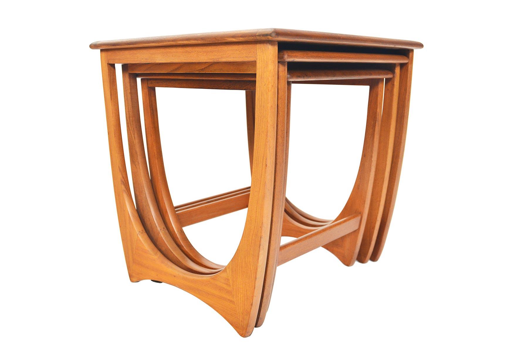 This timeless set of Mid-Century Modern G Plan Astro teak nesting tables was designed by Victor Wilkins in the 1960s. Gorgeous design and exceptional construction throughout. Recently refinished and in excellent condition.