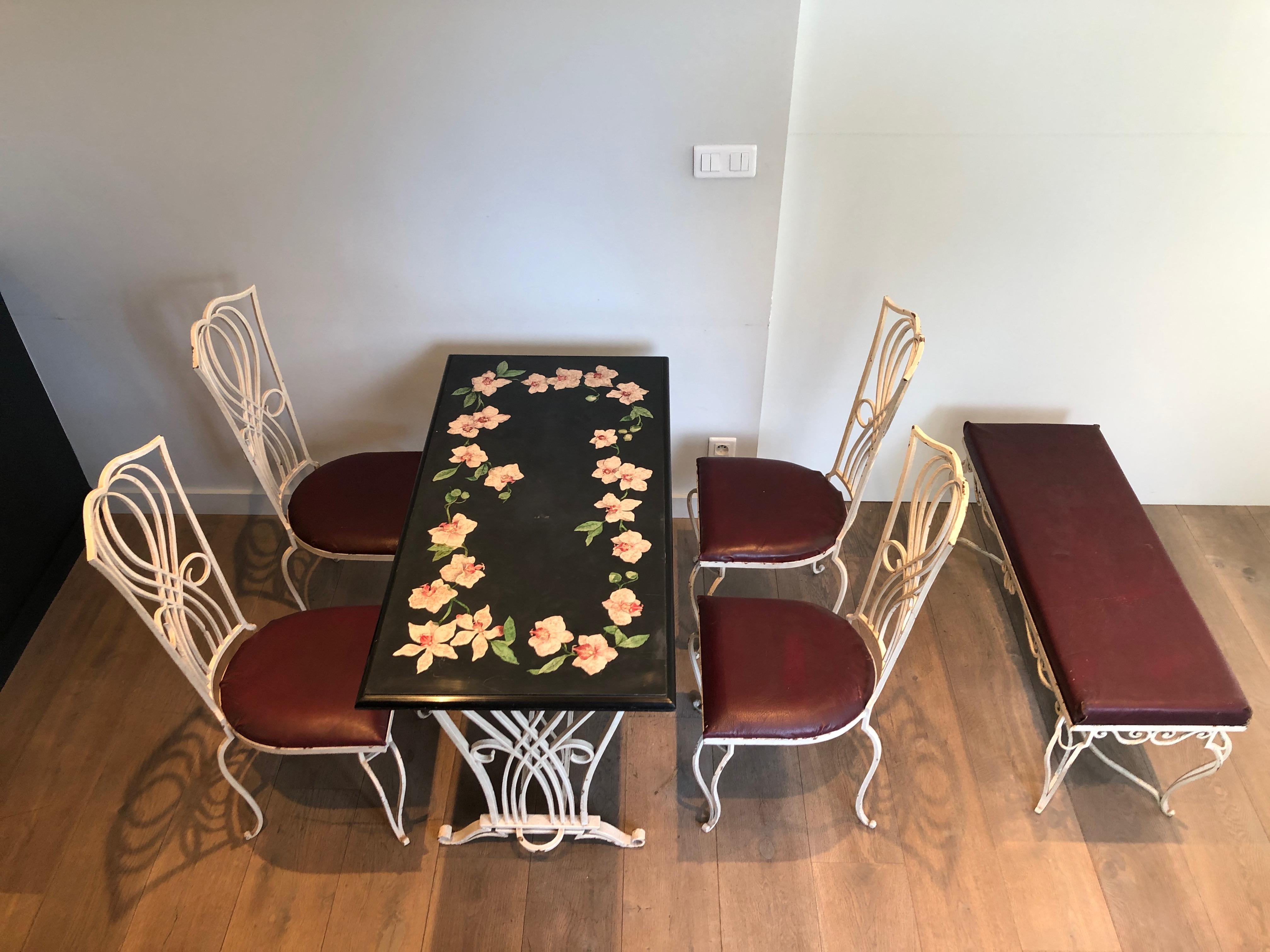 Set of garden furniture composed of a table made of wrought iron and signed Scagliola marble top, 4 chairs and a bench. French Work in the style of René Prou. Circa 1940