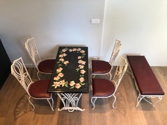 Ensemble de meubles de jardin en fer forgé et plateau en marbre signé Scagliola