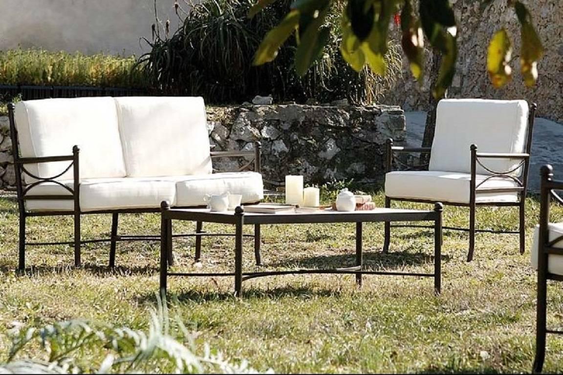 Set of garden furniture with two armchairs and one sofa in forged iron
Beautiful handmade set of patio or garden furniture. It´s made of forged iron with a special antioxidant painting.
Cushions included.

Armchairs measurements:
H 35.43 in
W