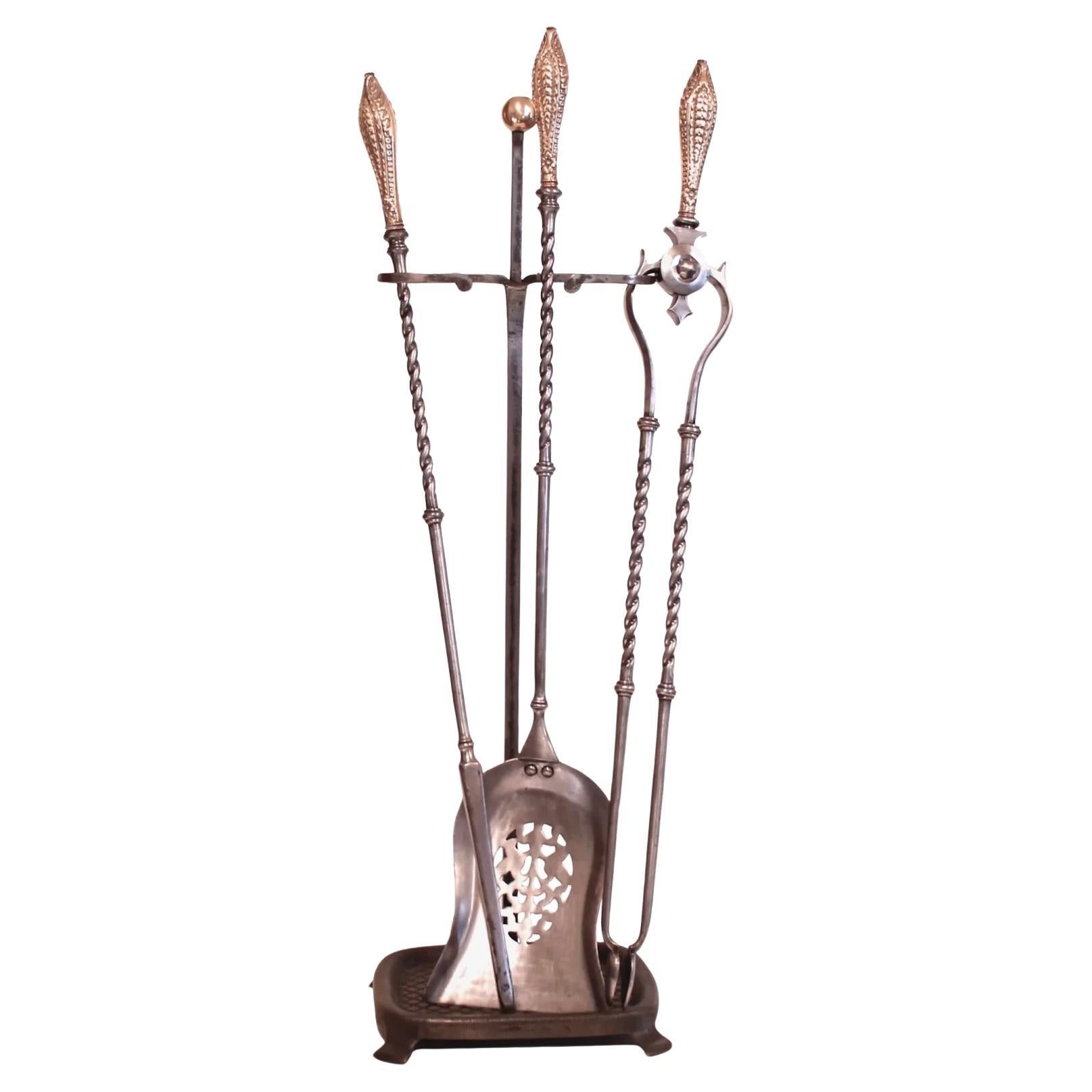Set Of Georgian Period Polished Steel And Brass Firetools Together With Stand