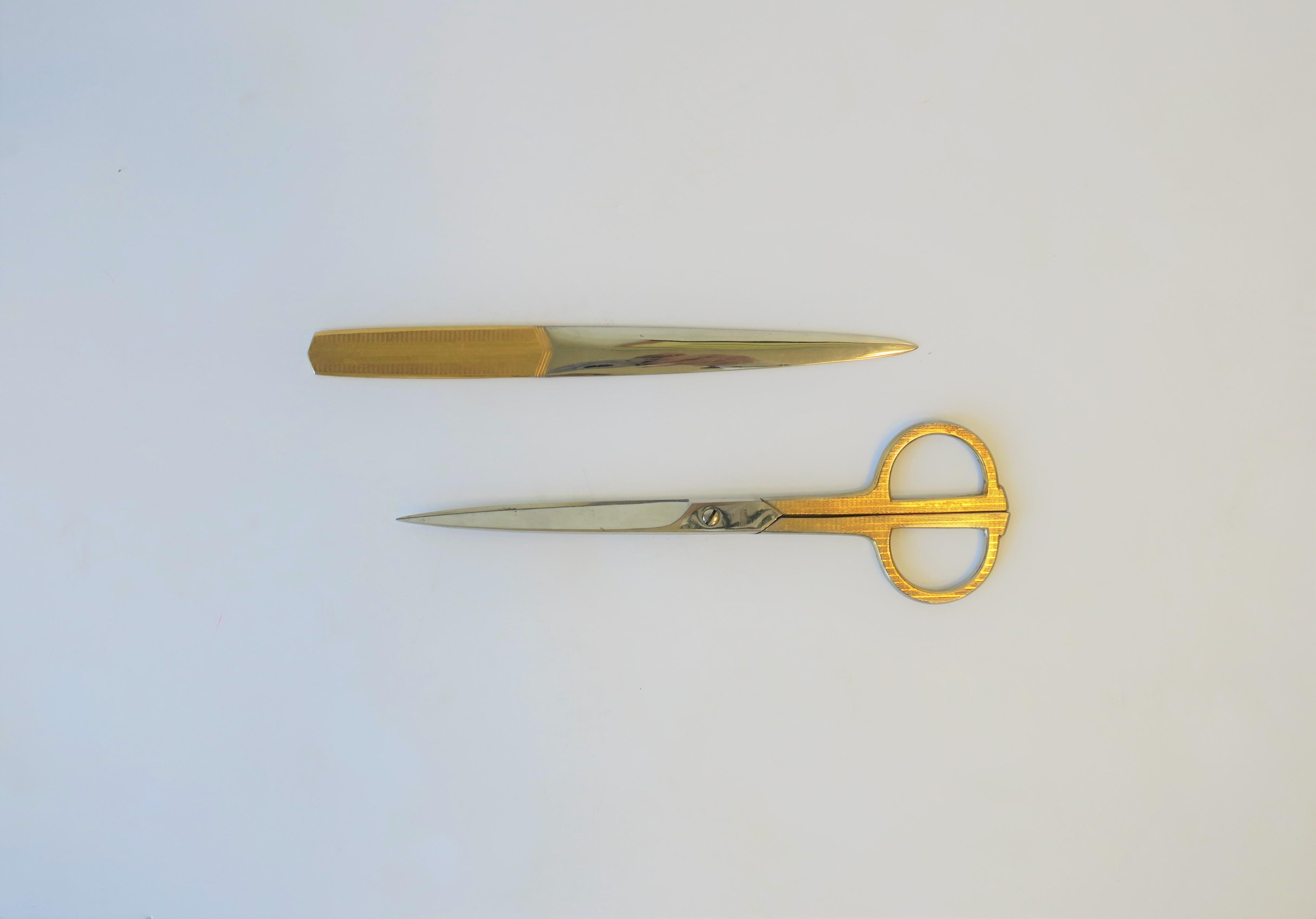 A beautiful set of fine German brass and stainless steel scissors and letter opener by 'Grasoli Solingen', 20th century, Germany. In fine working order. Great for a desk, office, etc. With maker's mark, see images #9 and 10. 

Measures: