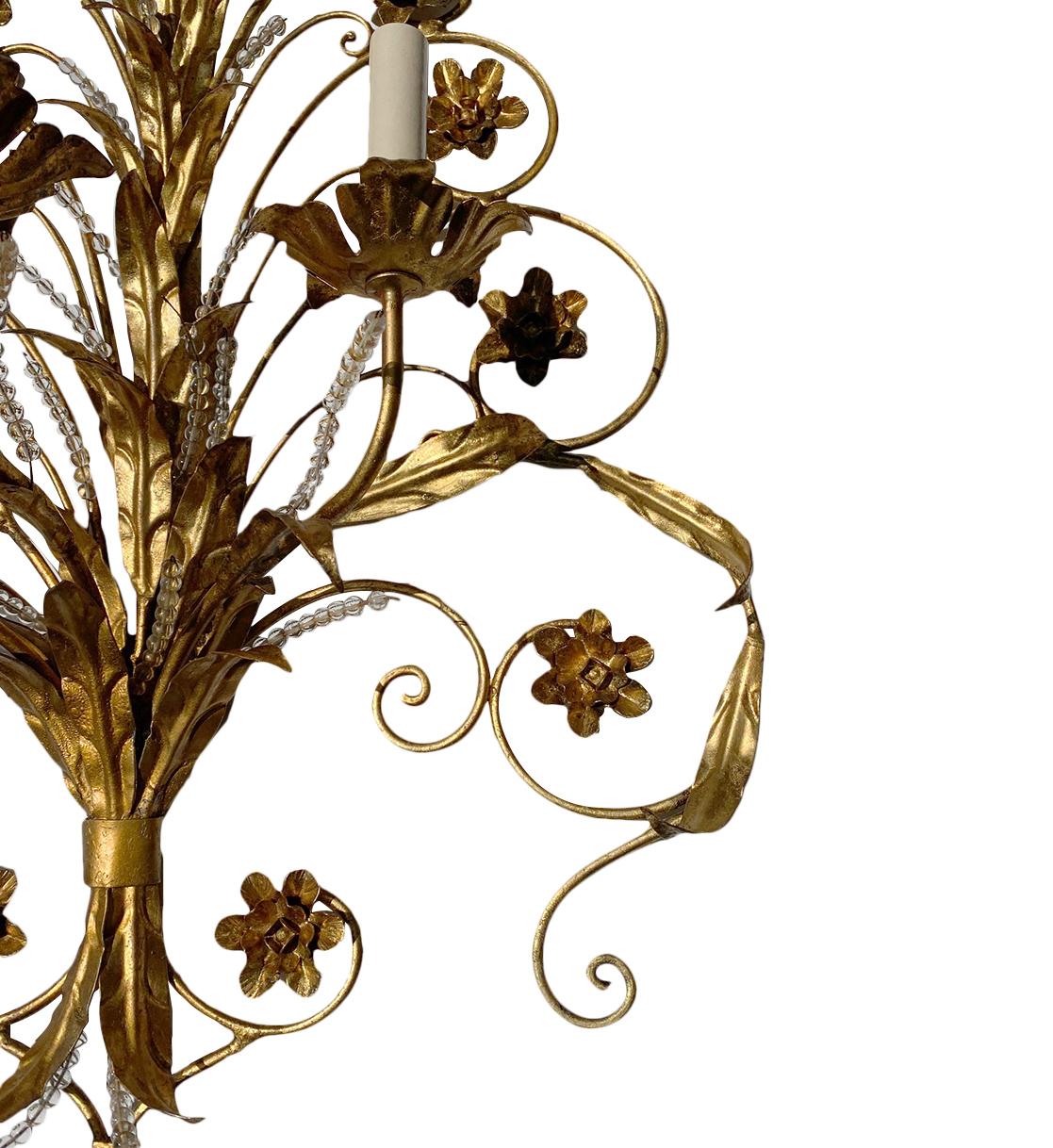 Italiano Set di applique in metallo dorato, vendute a coppia in vendita