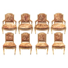Satz von 4 Fauteuils aus vergoldetem Holz und 4 Beistellstühlen mit Aubusson-Polsterung