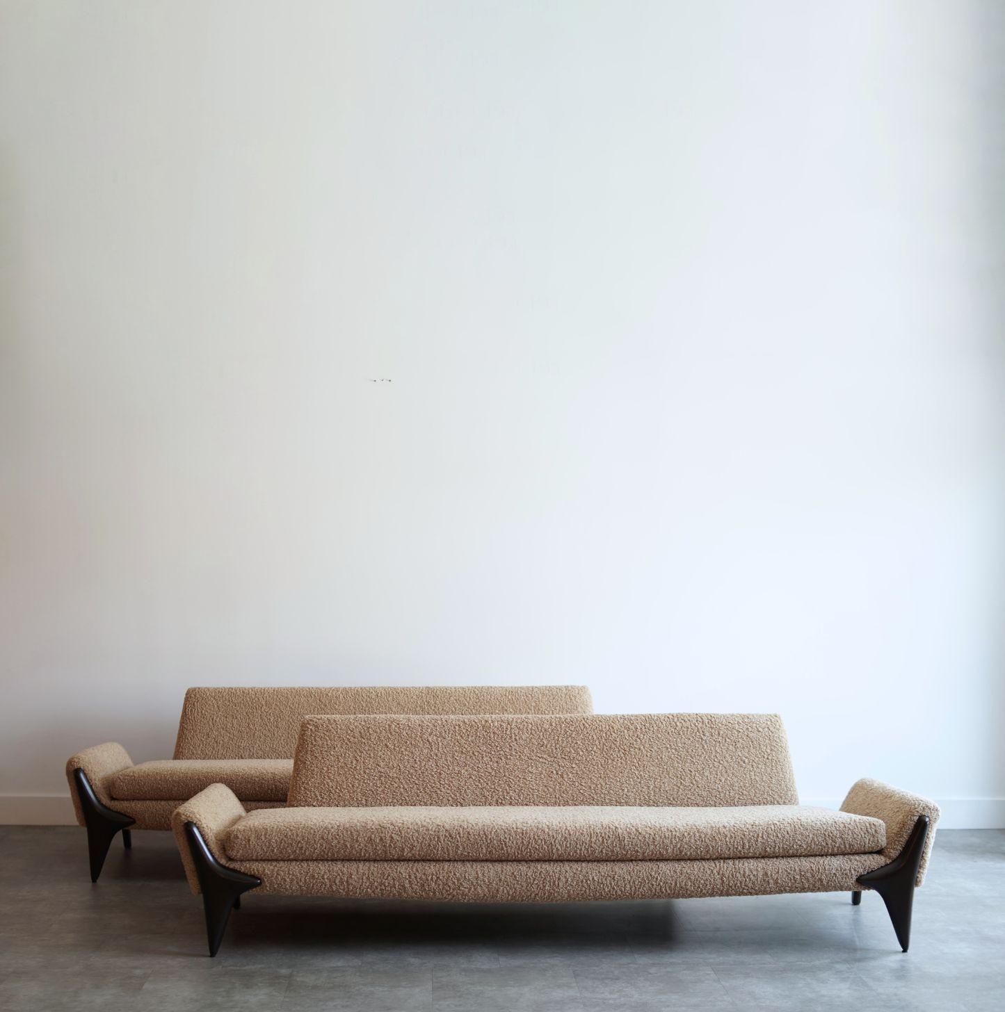 Set of iconic gondola sofas by Adrian Pearsall, circa 1950s, masterfully restored by Stamford Modern. These sculptural designs feature sweeping lines and low profiles, embodying mid-century elegance. Expertly reupholstered in luxurious natural