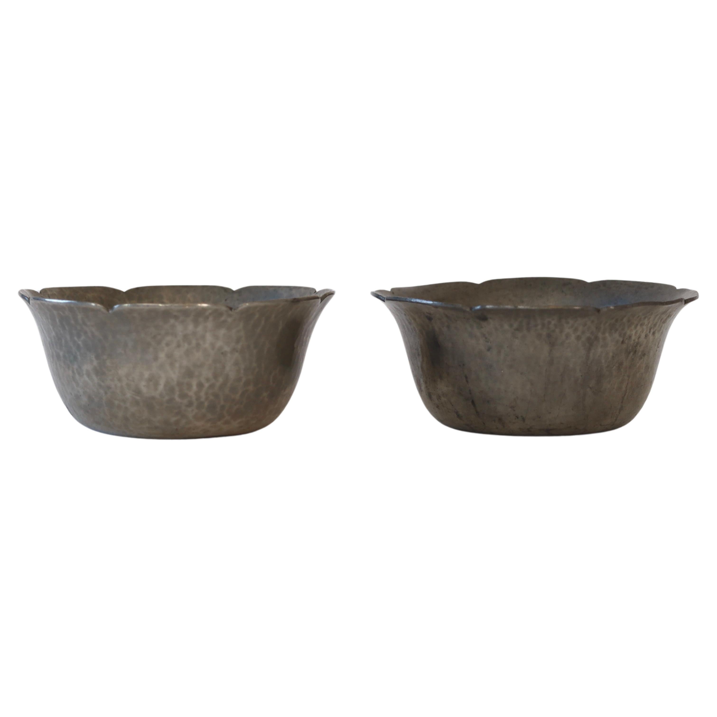 Set of hammered pewter bowls by Just Andersen, 1920s, Denmark