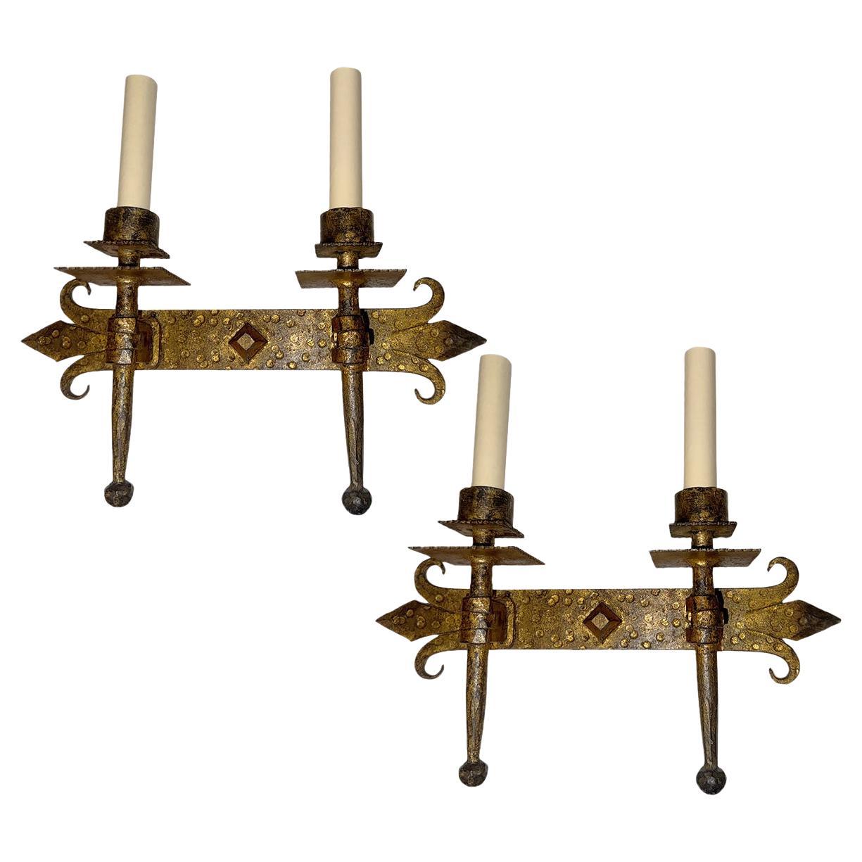 Ensemble d'appliques en fer forgé martelé