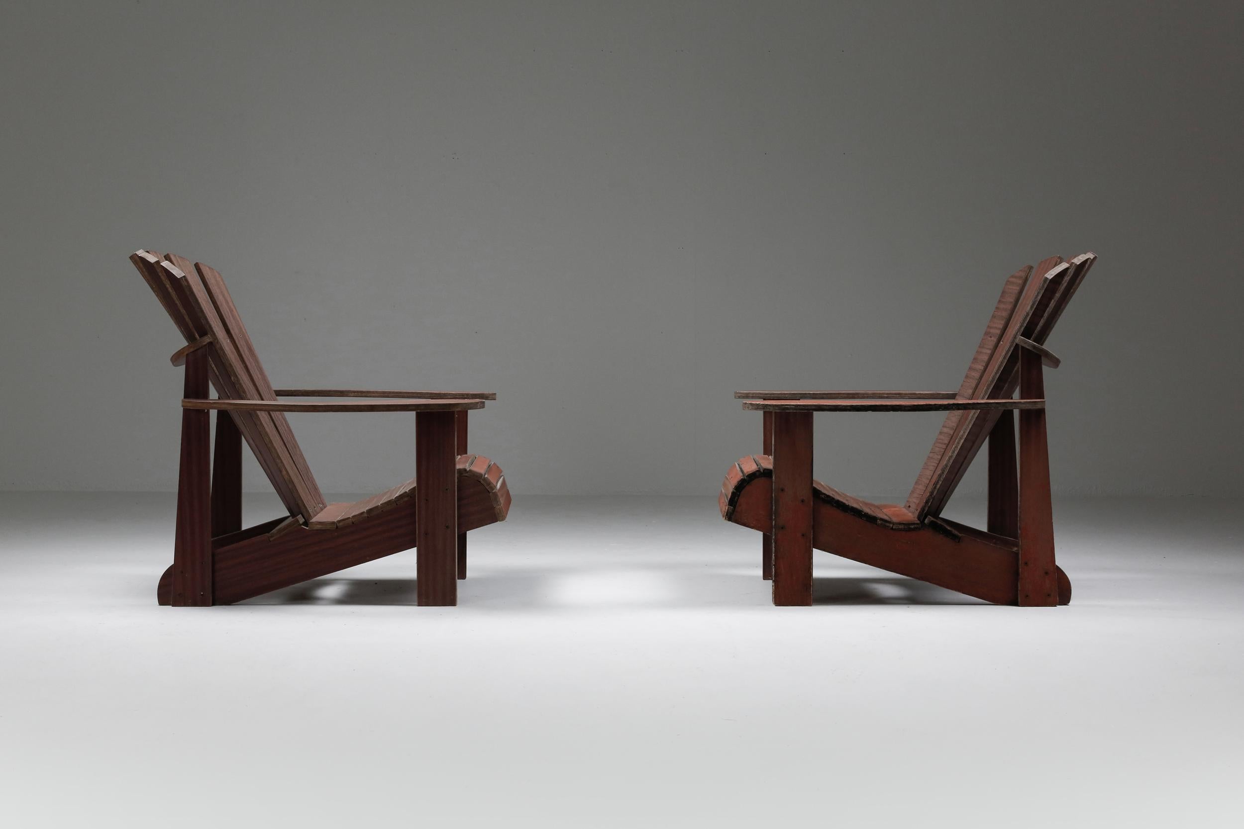 Garden arm chair Mid-Century Modern
Deckchairs; Adirondack chair; lounge chair: garden chair

The Adirondack chair is an outdoor lounge chair with wide armrests, a tall slatted back, and a seat that is higher in the front than the back. Its name