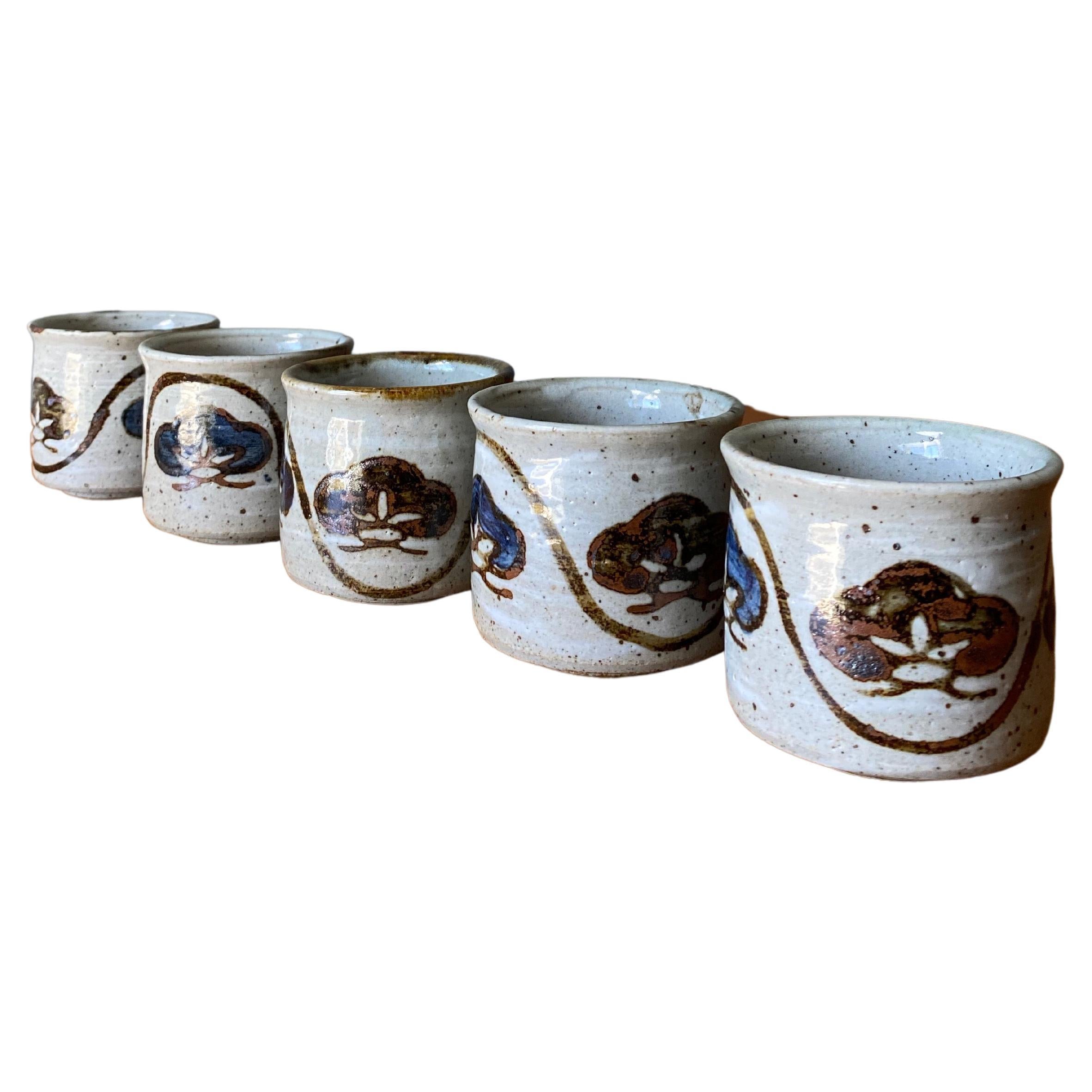 Set Of Hand Painted Pottery Tea Cups For Sale