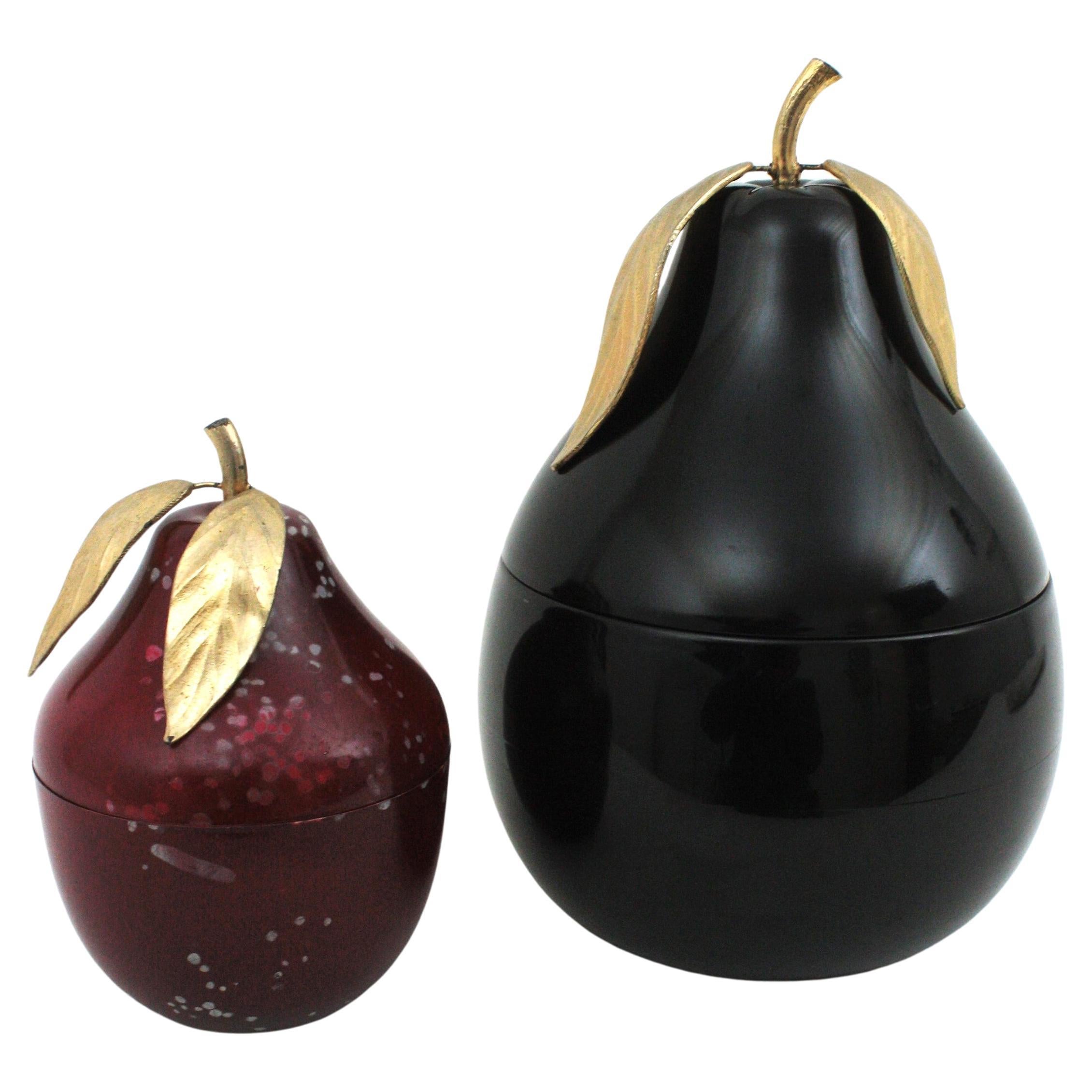 Pair of Pear shaped ice buckets by Hans Turnwald Collection.
1 Large pear ice bucket or champagne cooler in black color
1 small red pear ice bucket
These eye-catching ice buckets in the shape of a pear are luxurious addition to the home bar or just