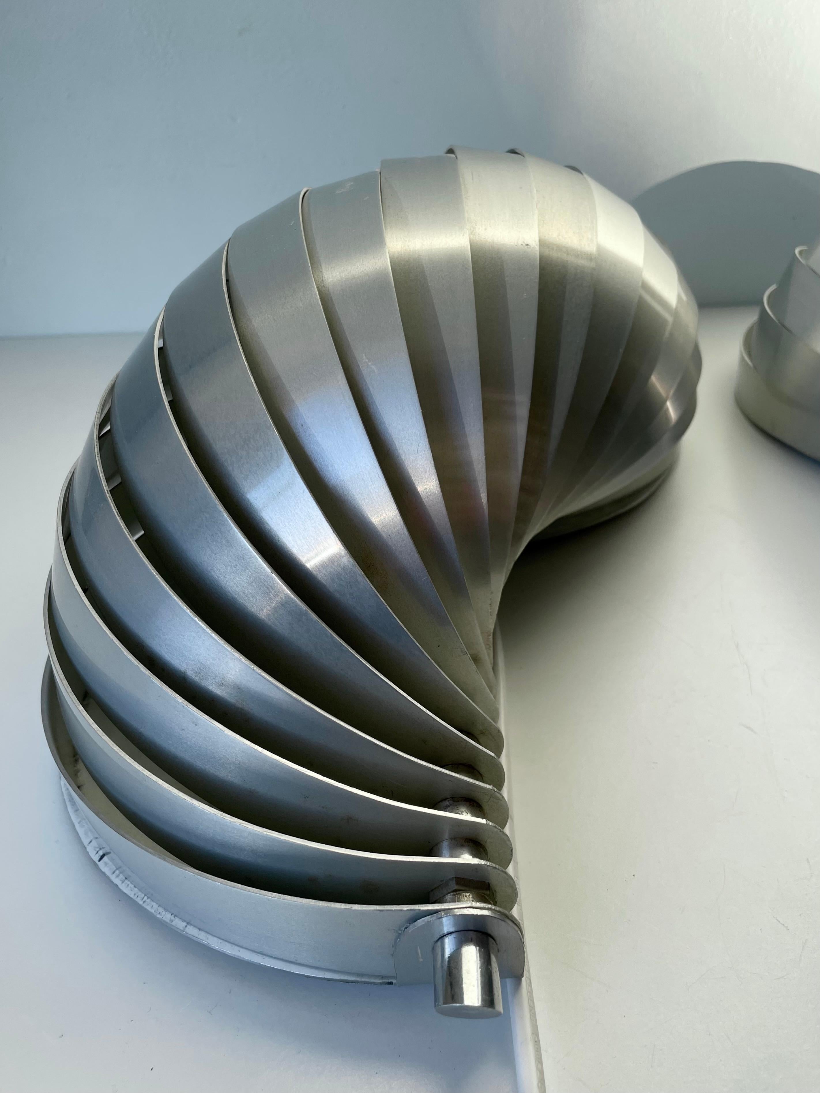 French Set of Henri Mathieu Twirling Aluminum Modern Wall Lights, 1970s For Sale