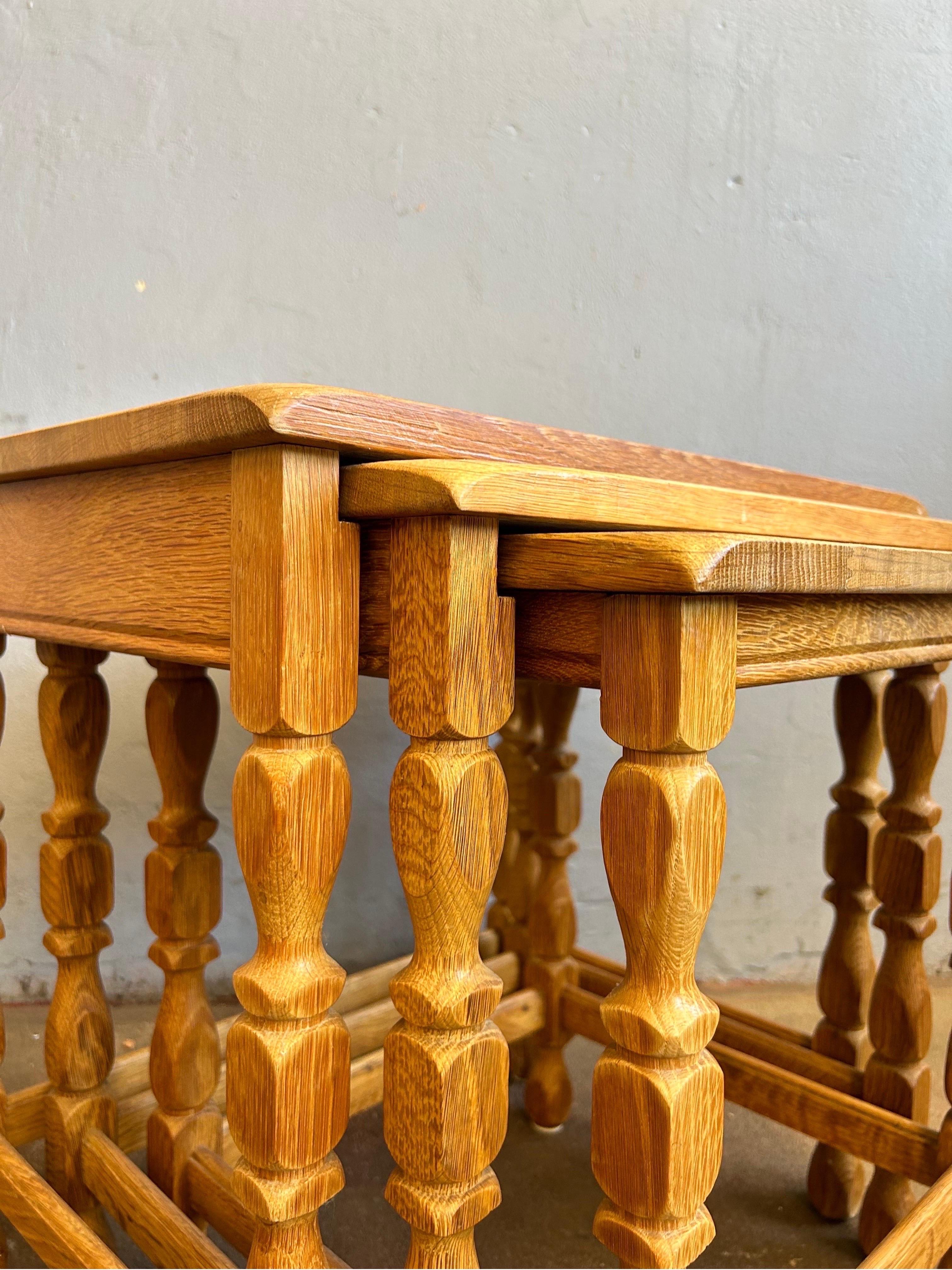 Set of solid oak nesting tables designed by danish designer Henry Kjærnulf also known as Henning Kjærnulf.
The nesting tables are very similar to the chairs designed by Henry Kjærnulf for his Razorblade series which has grown in popularite the last