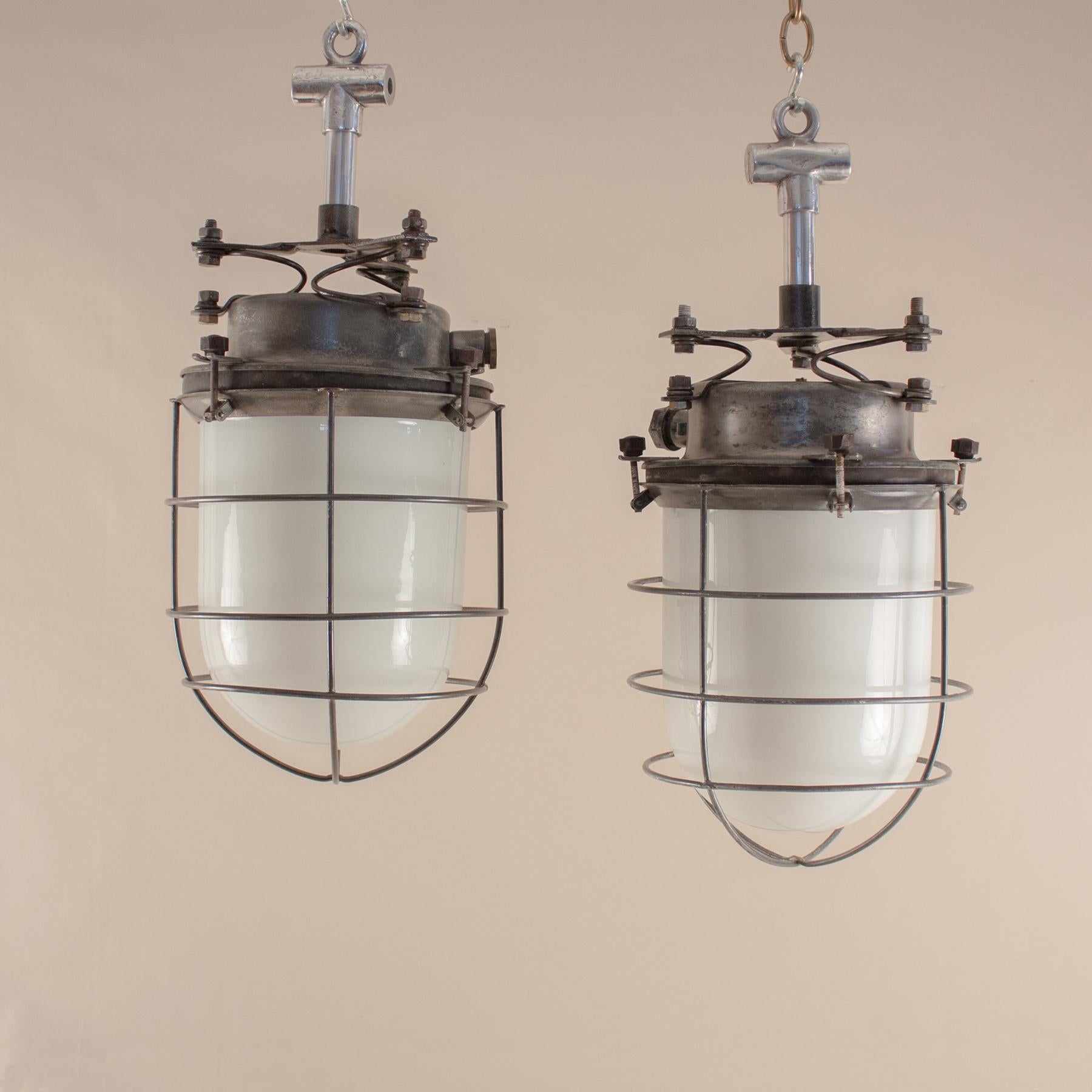 European  Industrial Milk Glass and Steel Caged Ship's Galley Lights