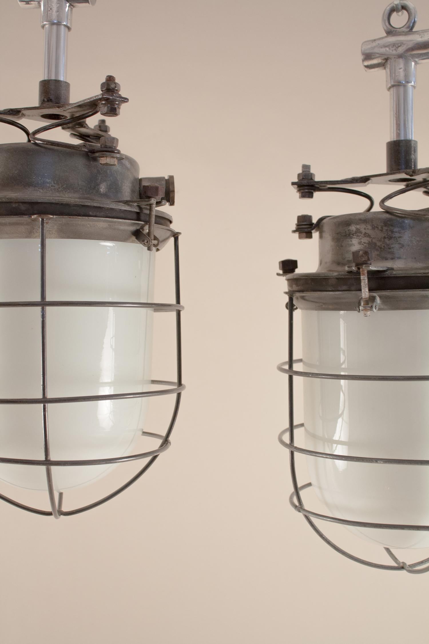 Industrial Milk Glass and Steel Caged Ship's Galley Lights In Good Condition In Heath, MA