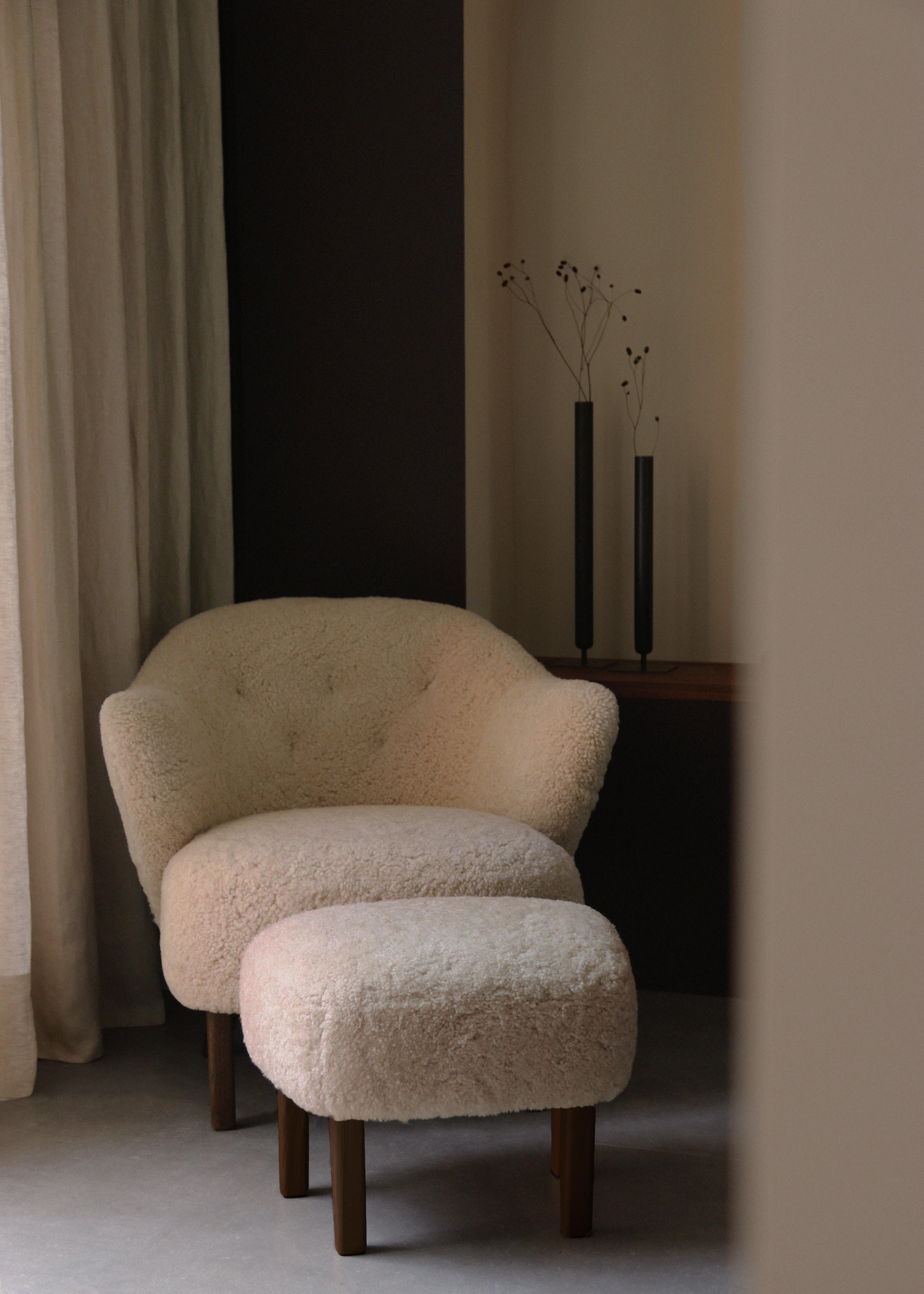 Ingeborg Lounge Chair
Named after the designer’s artist mother, Ingeborg Winding, the Ingeborg Lounge Chair from 1940 welcomes the sitter with open arms and an irresistibly charming expression. 
The lounge design features elegant sculptural armrests