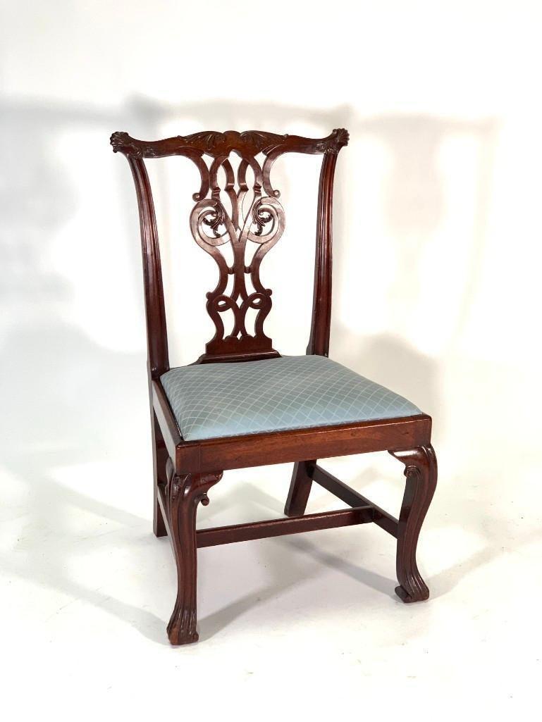 Fine set of six period Irish 18th c. Irish mahogany dining chairs, each with scroll carved crest rail with shell carved ears over pierce carved back splats and slip seats, raised on carved cabriole legs with Spanish feet joined by a stretcher bar,