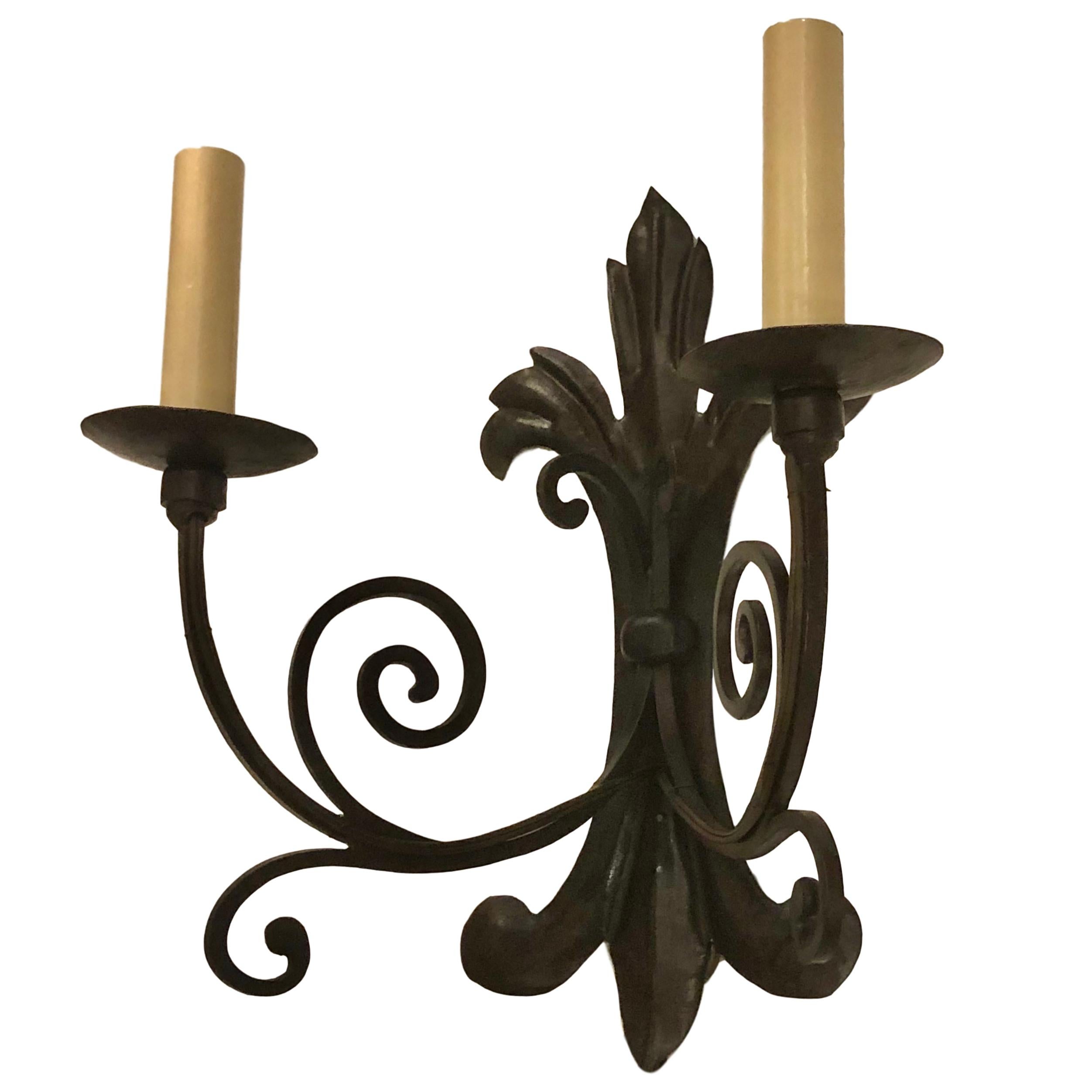 Set of Iron Foliage Motif Sconces, Sold Per Pair In Good Condition For Sale In New York, NY