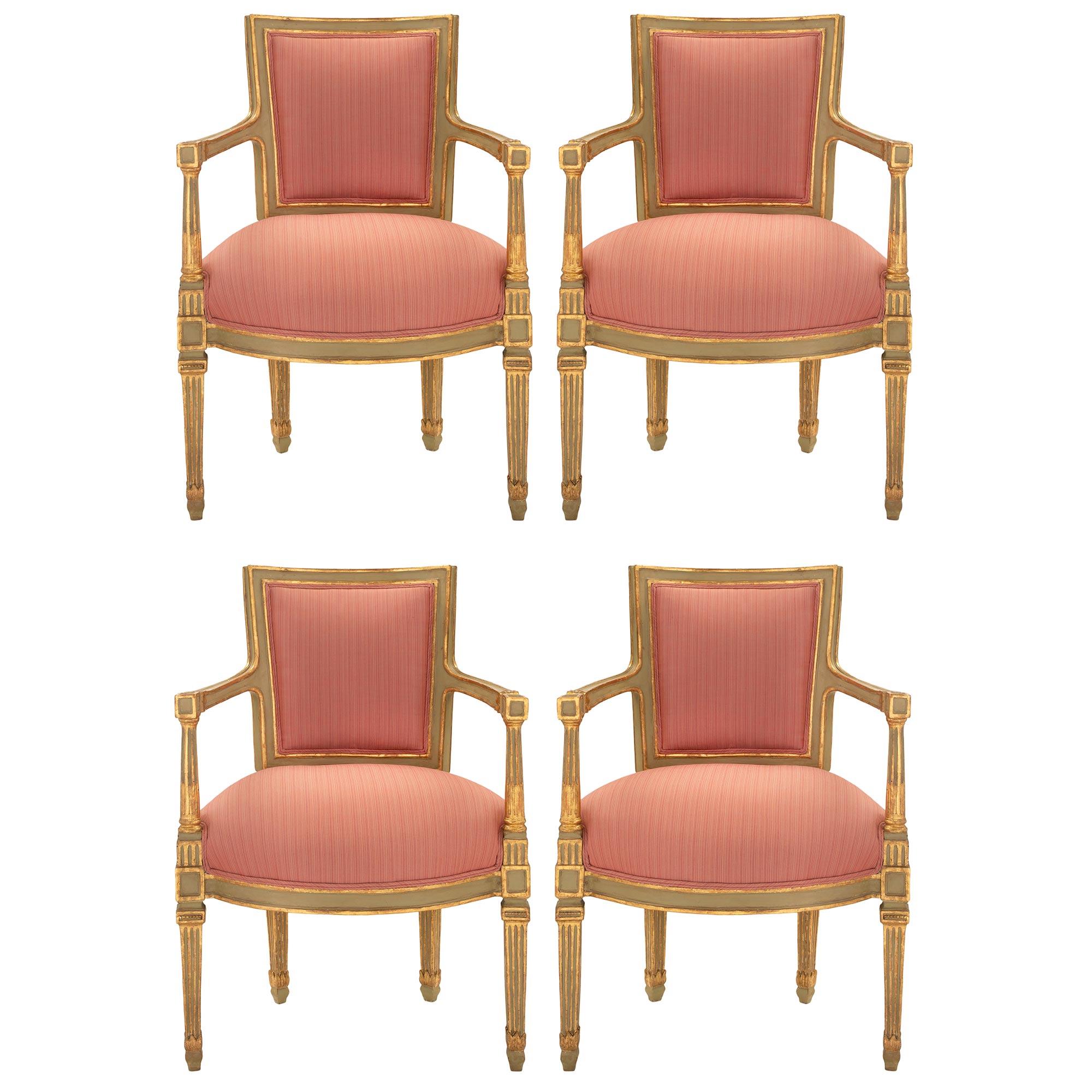 A striking and complete set of Italian 18th century Louis XVI period patinated and giltwood four armchairs and their matching settee, from Naples. Each is raised by elegant square tapered fluted giltwood and patinated legs. Above each leg are block