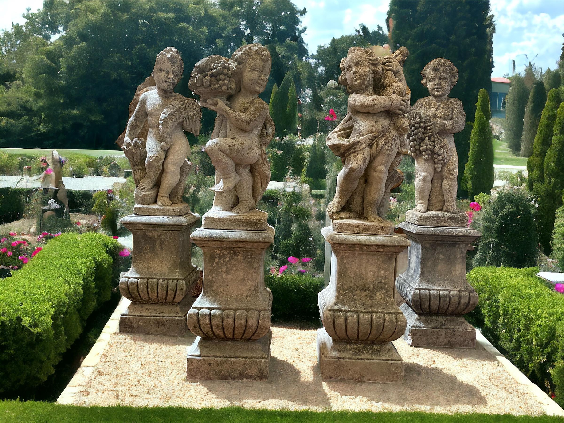 Classically draped finely carved standing putti figures and their distinguishing symbols on a square base. 
Autumn, winter, spring and summer. 
The sculptures has developed a great patina from several years of exposure in a lush garden. All the