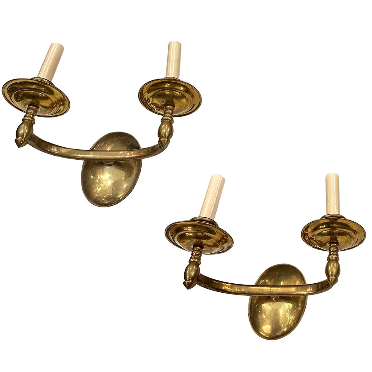Ensemble de huit appliques à double lumière en bronze italien des années 1950, avec patine d'origine. Vendu par paire.

Mesures :
Hauteur : 10
