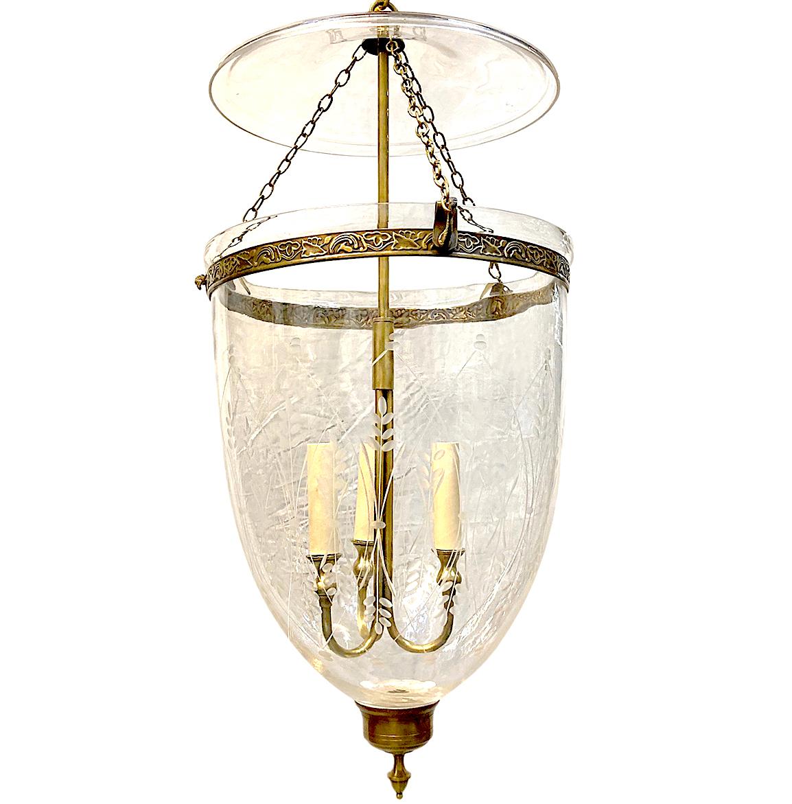 A set of three Italian etched glass lanterns with bronze fitting and three interior lights. Sold individually.

Measurements:
Diameter 14