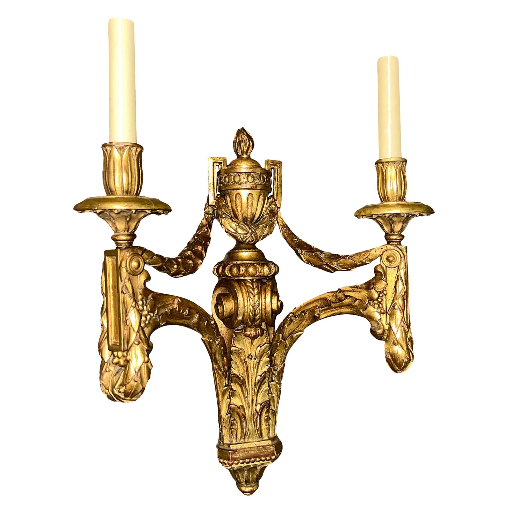 Carved Set of Italian Gilt Wood Sconces, Sold Per Pair For Sale