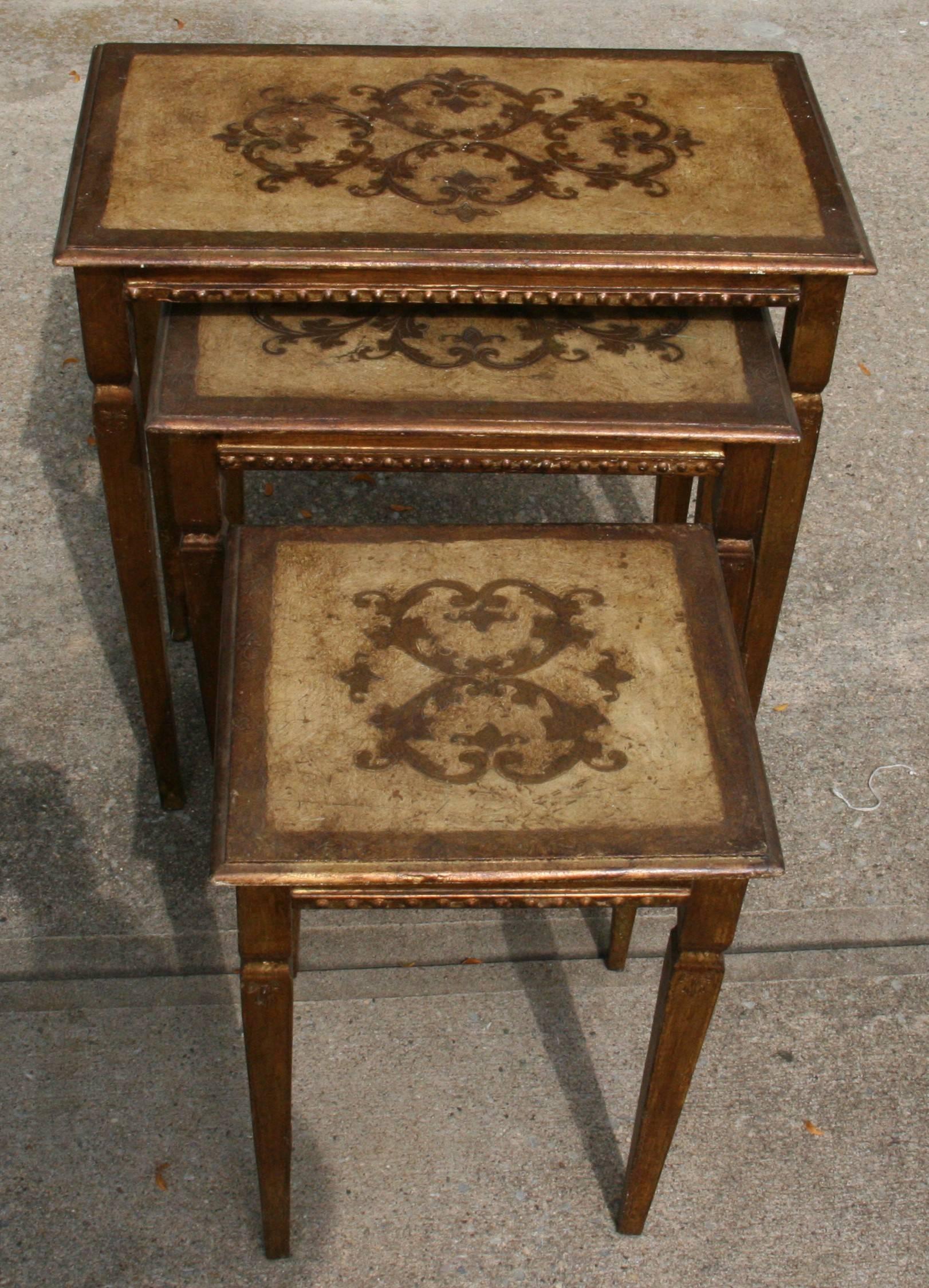 1-600 set of three rectangular nesting tables made in Florence. Age wear. Medium, 17