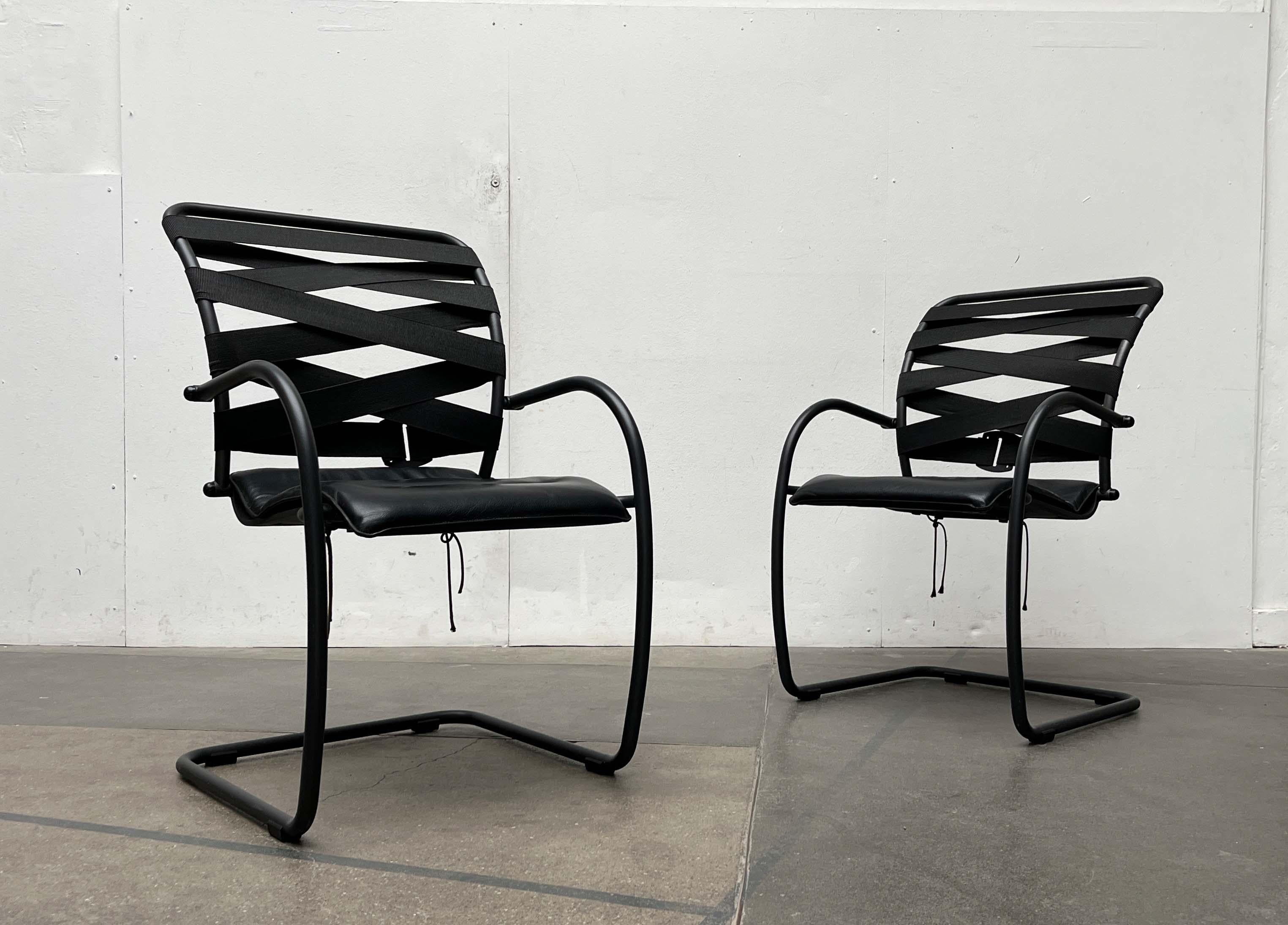 Rare cantilever chairs from Italy based on a design by Heron Parigi from the late 1980s.

A postmodern design in the style of the 1980s and early 1990s. The seat is made of solid cast aluminum. The armrests and the rest of the frame are made of