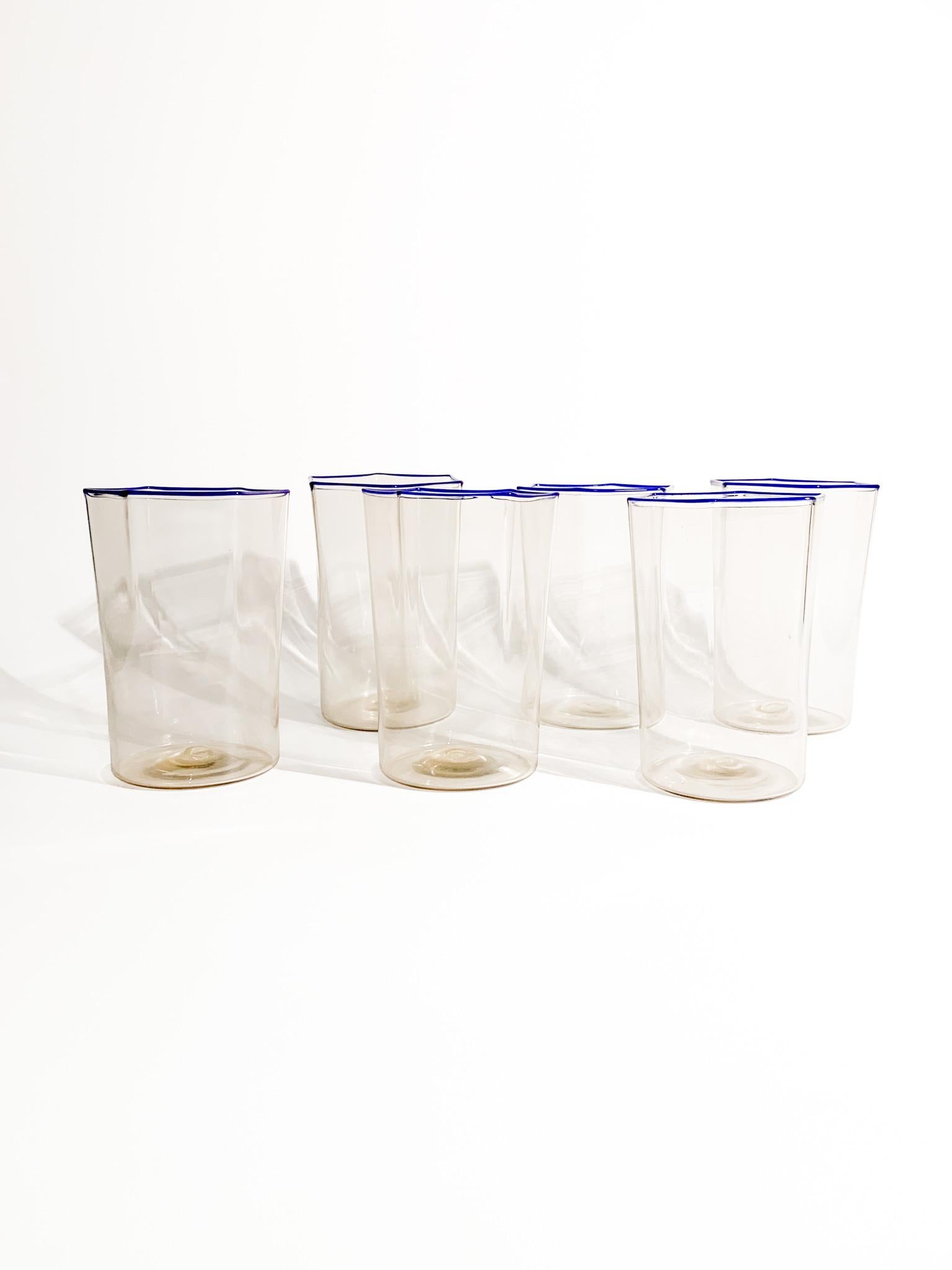Set of 6 hexagonal glasses in smoky blown Murano glass with blue rim, made by Carlo Scarpa for Venini in the 1930s

Ø cm 8 h cm 11,5

Carlo Scarpa (2 June 1906 – 28 November 1978) was an Italian architect and designer considered one of the most