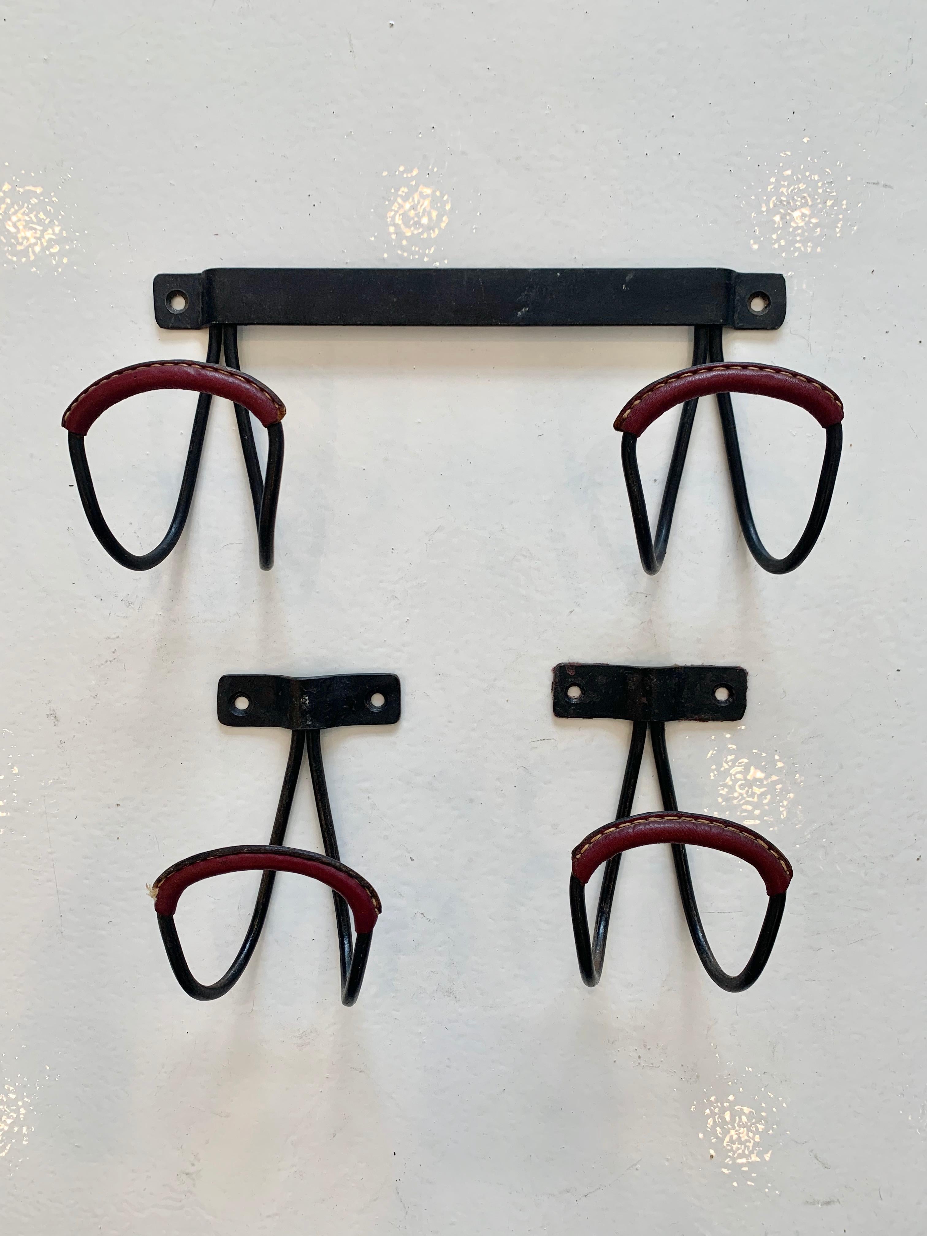 Set of Jacques Adnet Leather Hooks 5