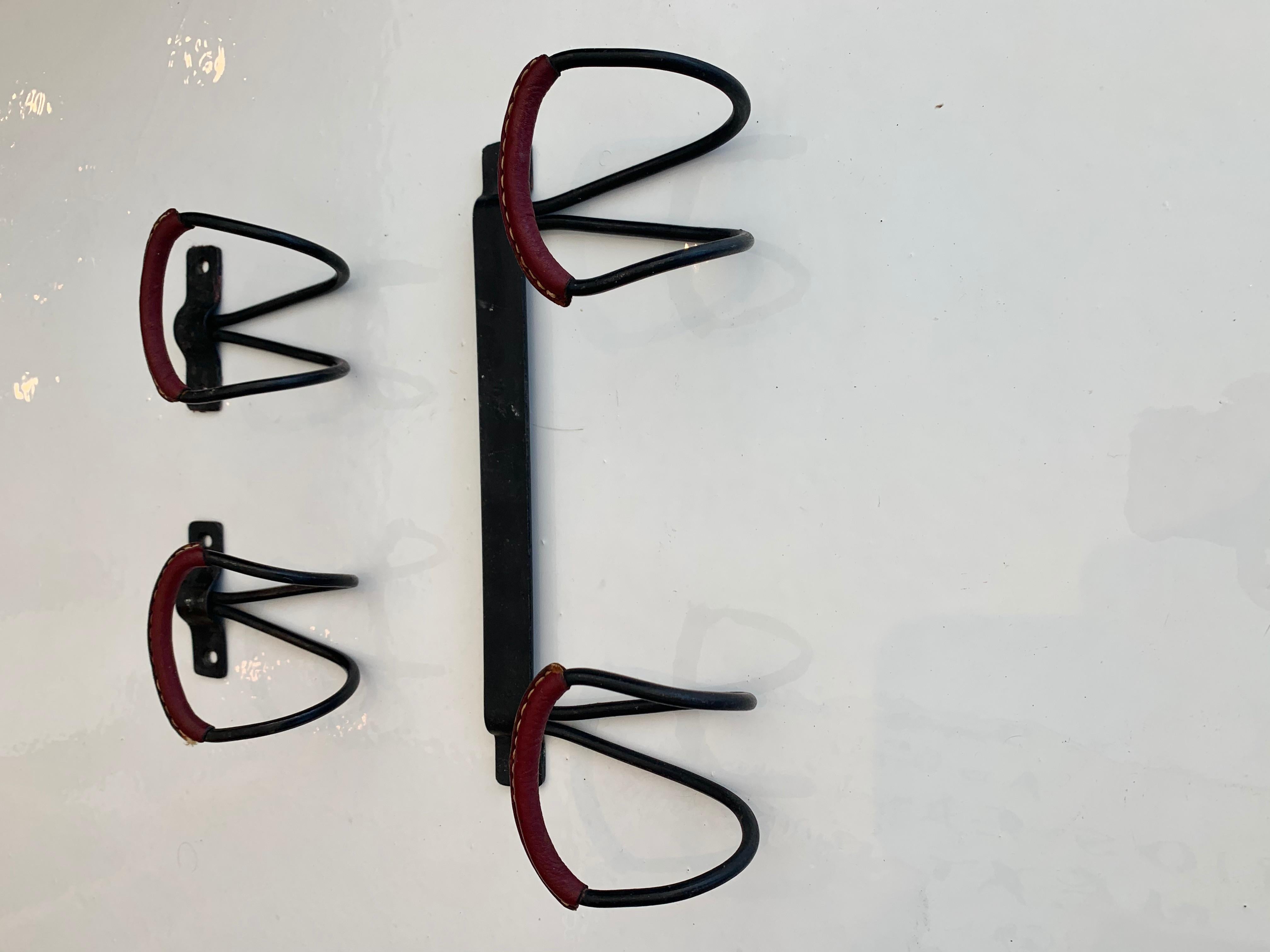 Set of Jacques Adnet Leather Hooks In Good Condition In Los Angeles, CA