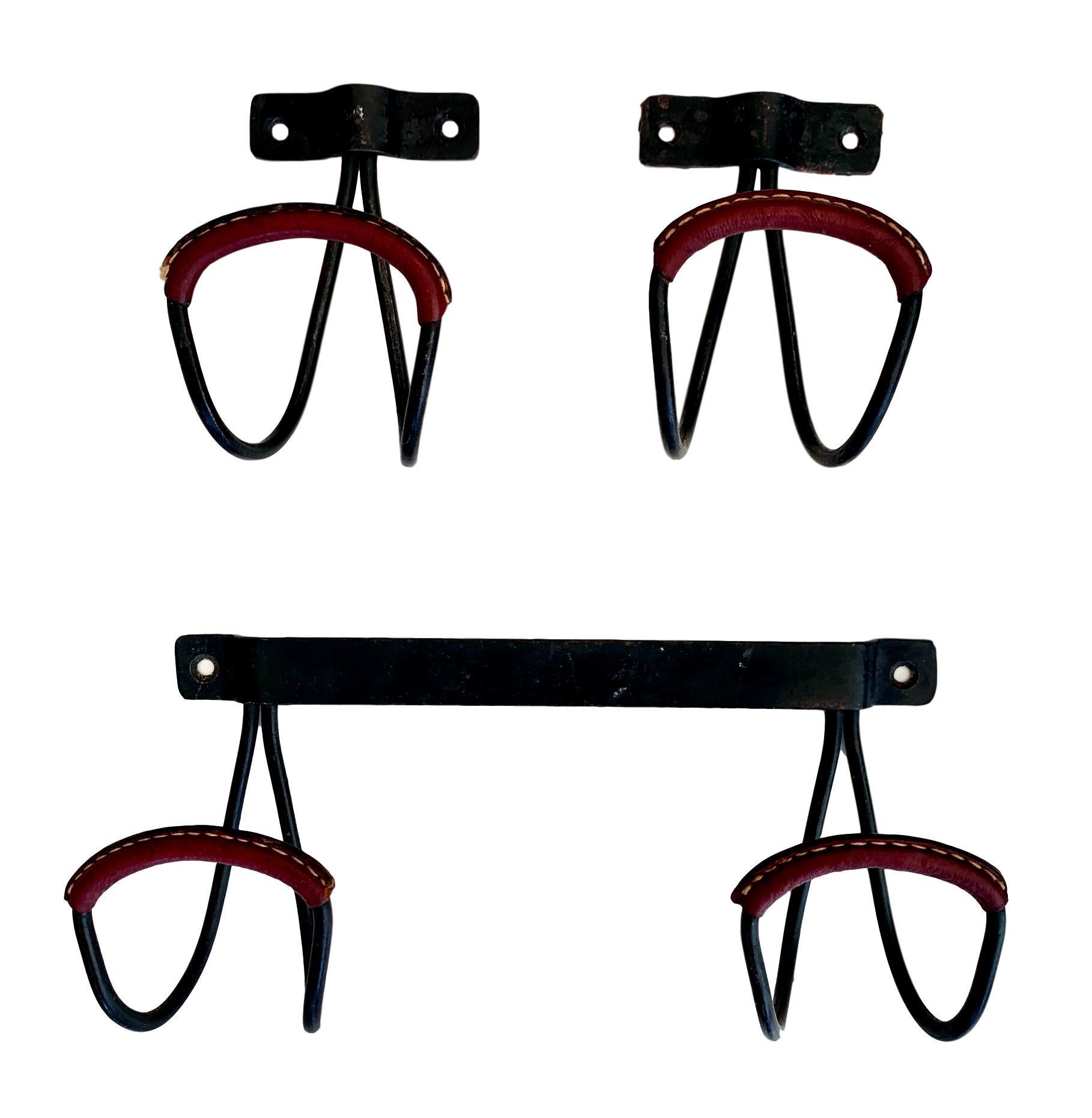 Mid-20th Century Set of Jacques Adnet Leather Hooks