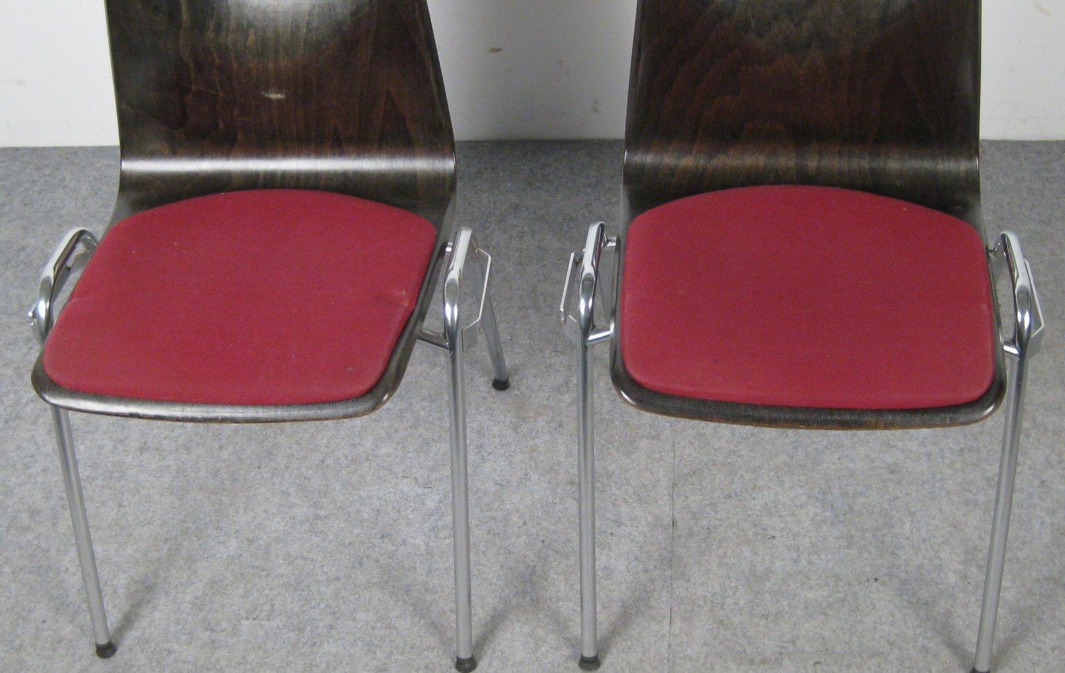Set of Pagwood chairs from the 1970s by Jahre von Thur-Op Set Pagwood / Industrial chairs. Stackable and rowable chromed tubular steel frame, brown pagwood seat, partly heavily grained. On the seat a fixed pillow covered with red woollen fabric.