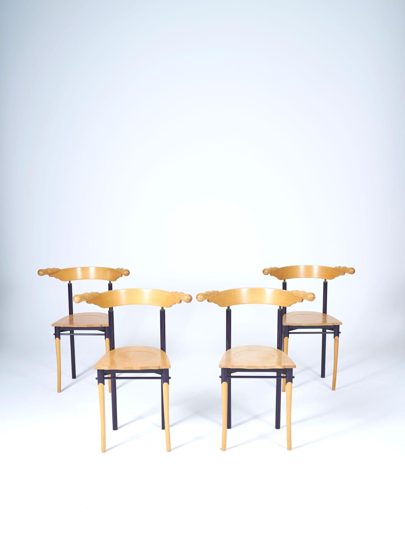 Set of 4 chairs model 'Jansky' by designer Borek Sipek, published by Driade in the 1980s. The armrests are made of maple, and the frame is in lacquered metal. Rare in this original condition, these chairs can fit into an interior with furniture by