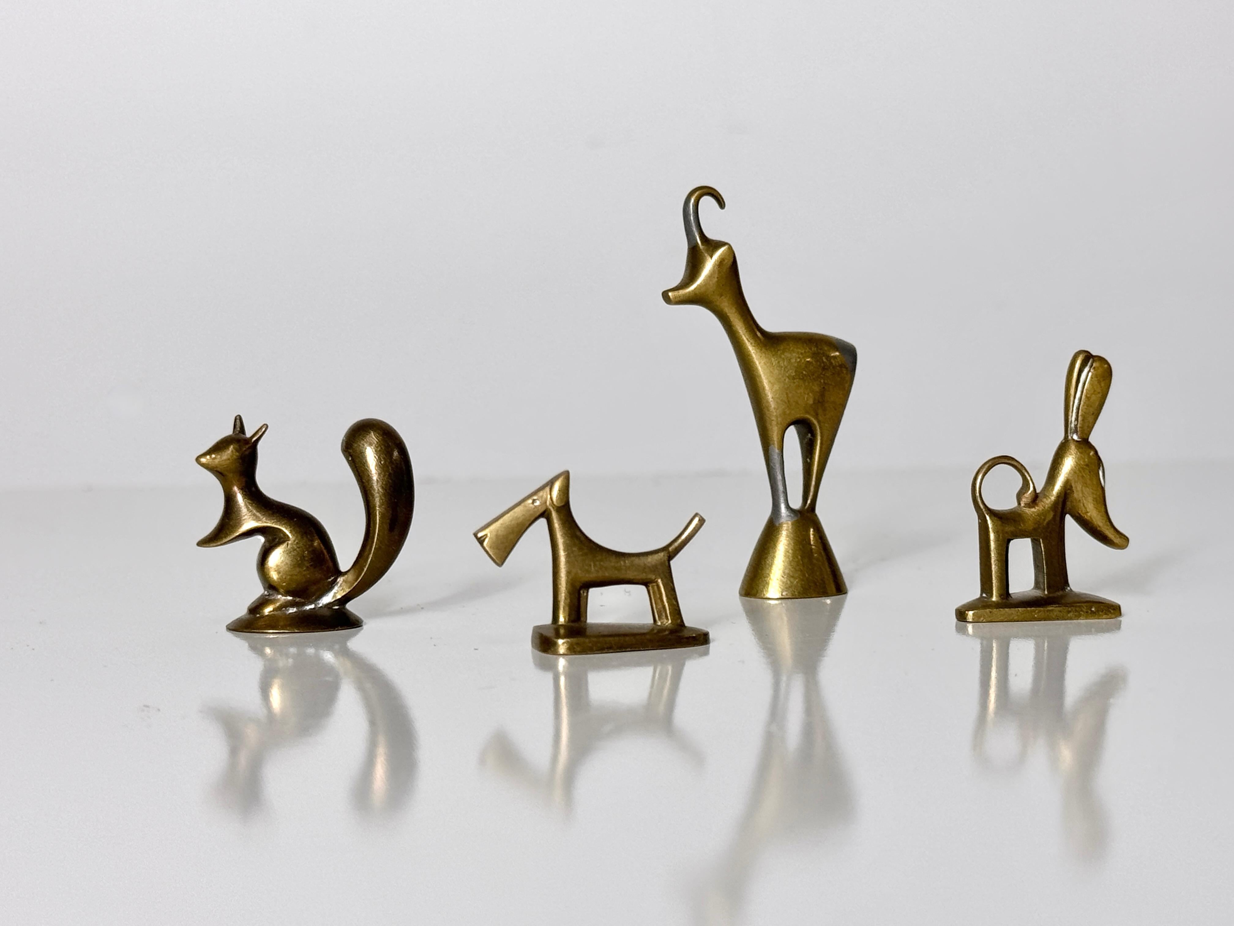 A grouping of 4 bronze miniatures originally designed by Karl Hagenauer circa 1940s for Werkstatte Hagenauer Wien Austria

Stylized animal figures in solid bronze and stamped to underside
Dimensions vary with the largest being 2.25 inches

Exact