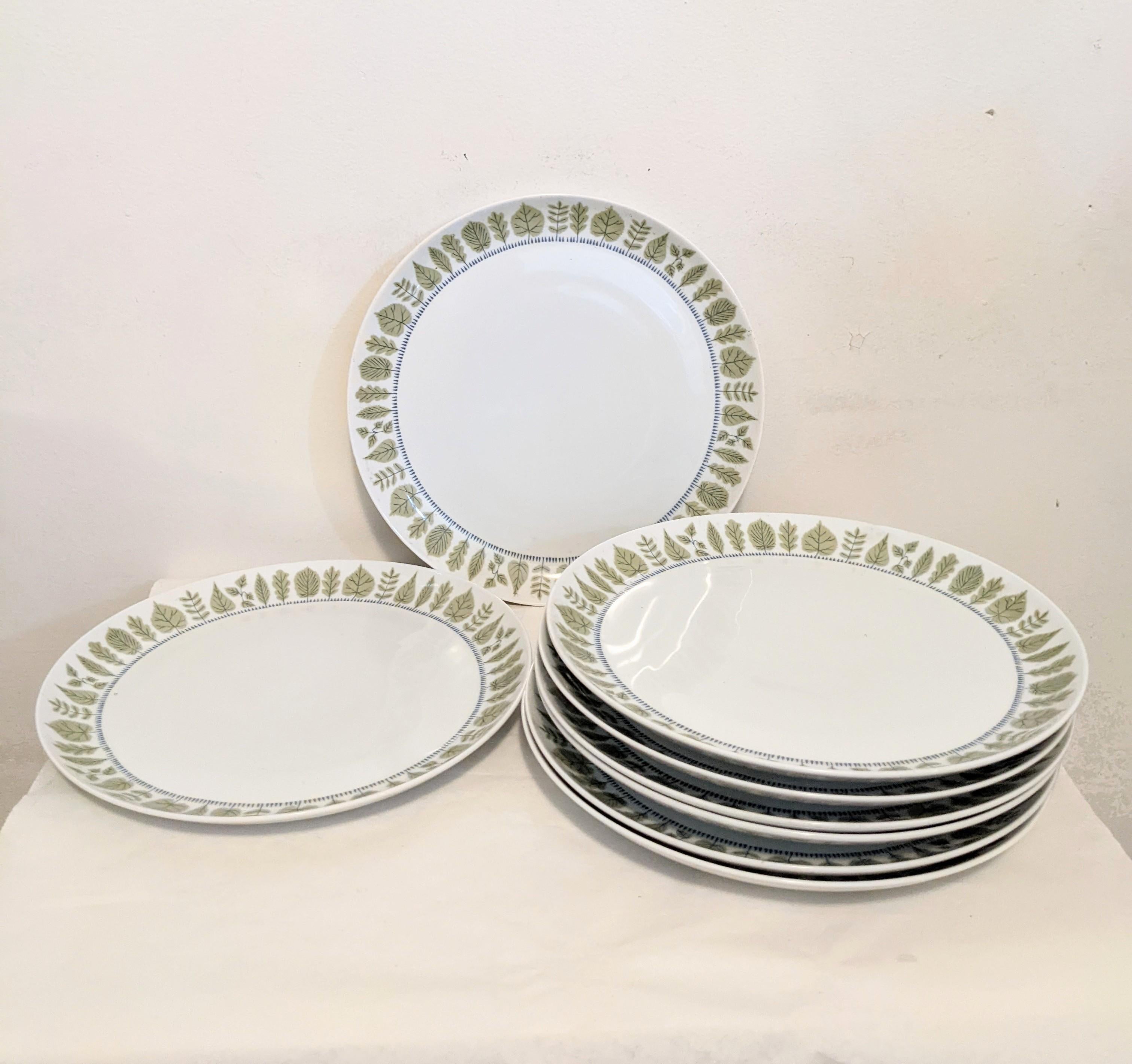 Set of 8 Upsala Ekeby Serving Platters, Karlskrona Sylvia Pattern from the 1960's with autumnal leaf edge pattern which is a beautiful Karlskrona classic. Can be used as a dinner plates, but they are rather large and would well as a set of lovely