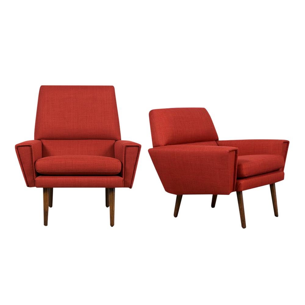 Indulge in the epitome of Danish design with our fully restored Pair of Vintage Kurt Ostervig Danish Lounge Chairs. These 1960s armchairs have been skillfully upholstered in striking new red fabric, offering a luxurious and comfortable seating