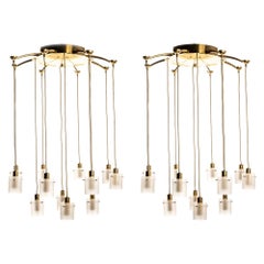 Set di grandi lampadari in vetro e ottone