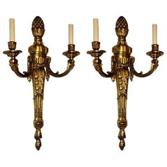 Conjunto de grandes candelabros de bronce