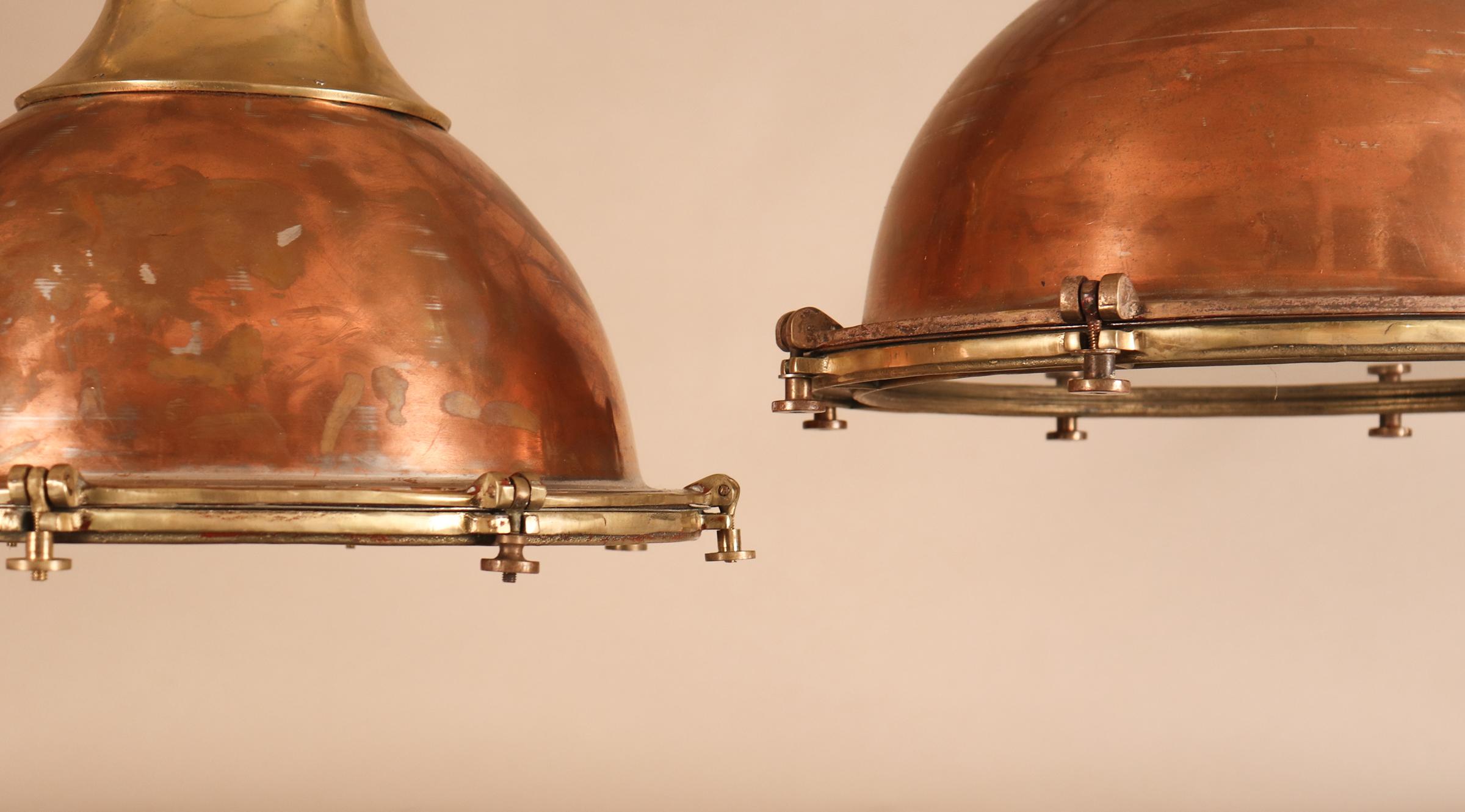 Unknown Set of Large Copper and Brass Nautical Pendant Lights