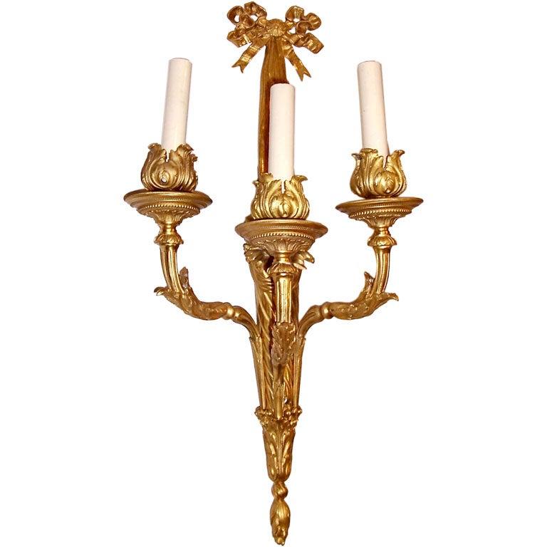 Set of four circa 1920 French fine-detailed gilt bronze Louis XVI style sconces. Sold per pair.
Measurements
Height: 23.5